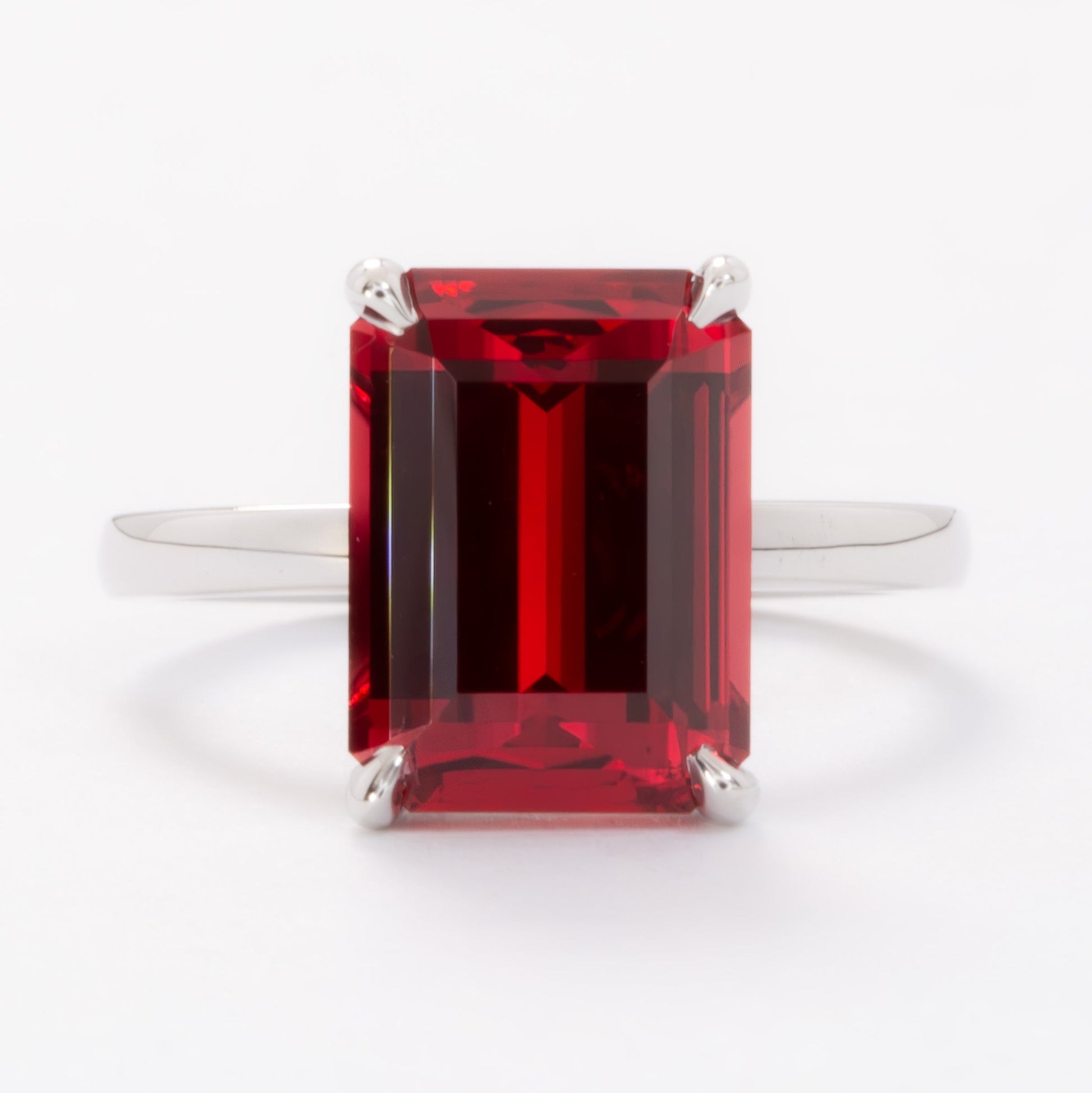 cali solitaire ring with step cut lab ruby