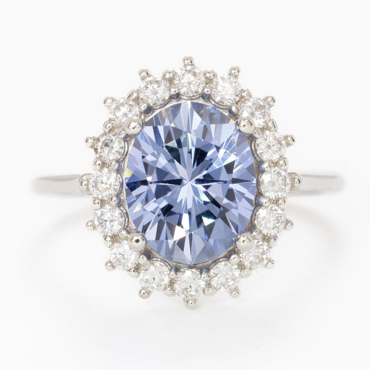 calypso halo engagement ring with oval blue lab sapphire