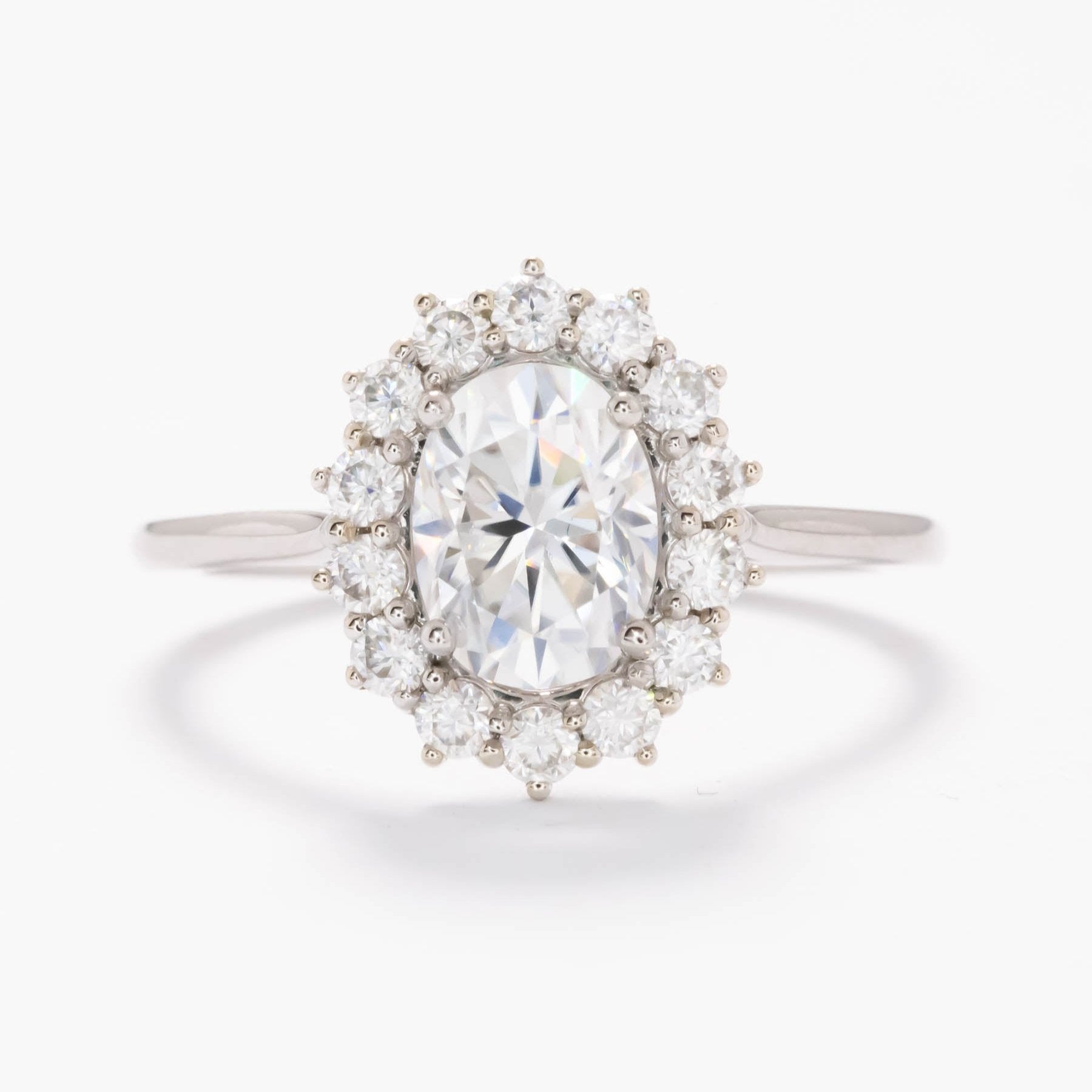 calypso halo engagement ring with white moissanite