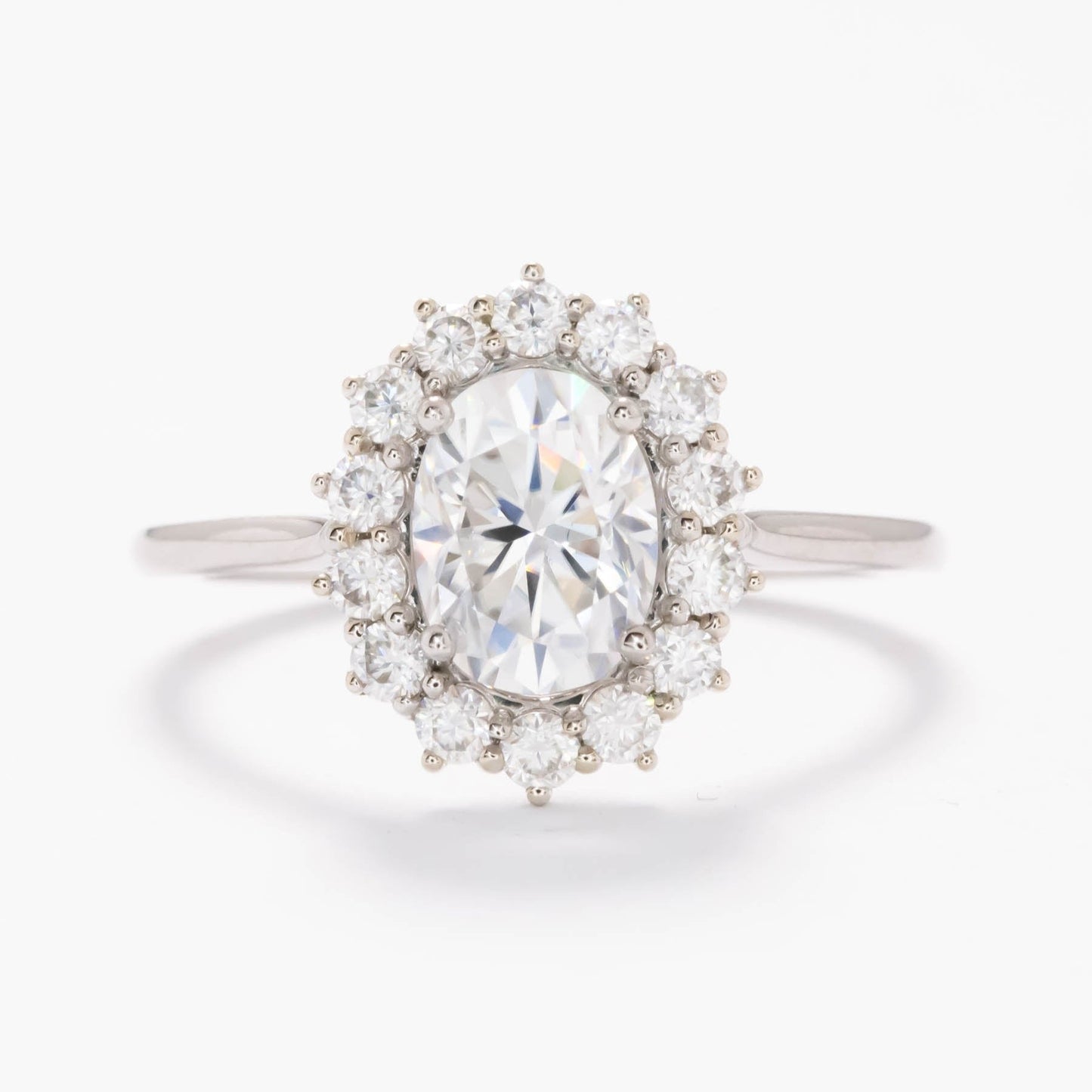 calypso halo engagement ring with white moissanite