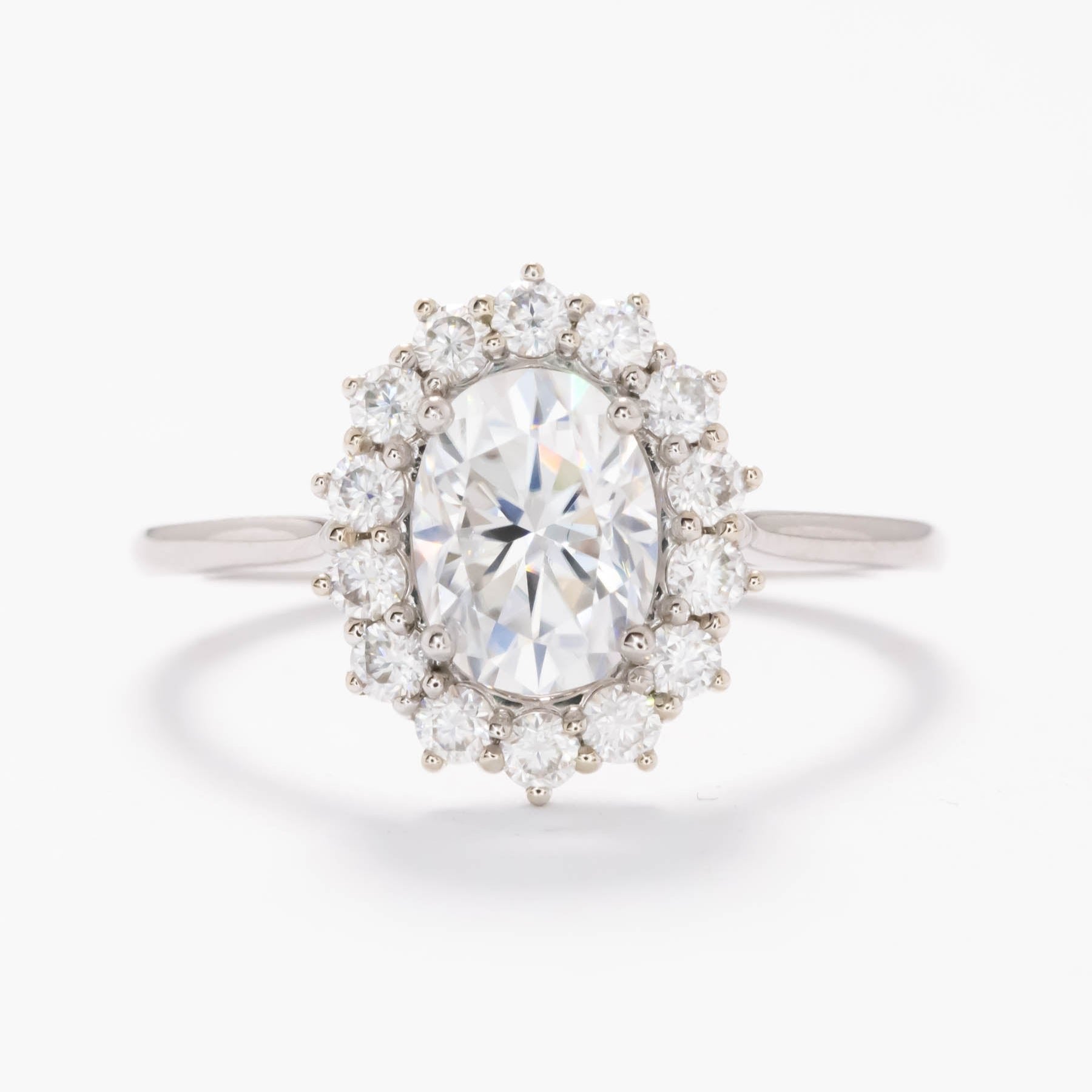 calypso halo engagement ring with white moissanite