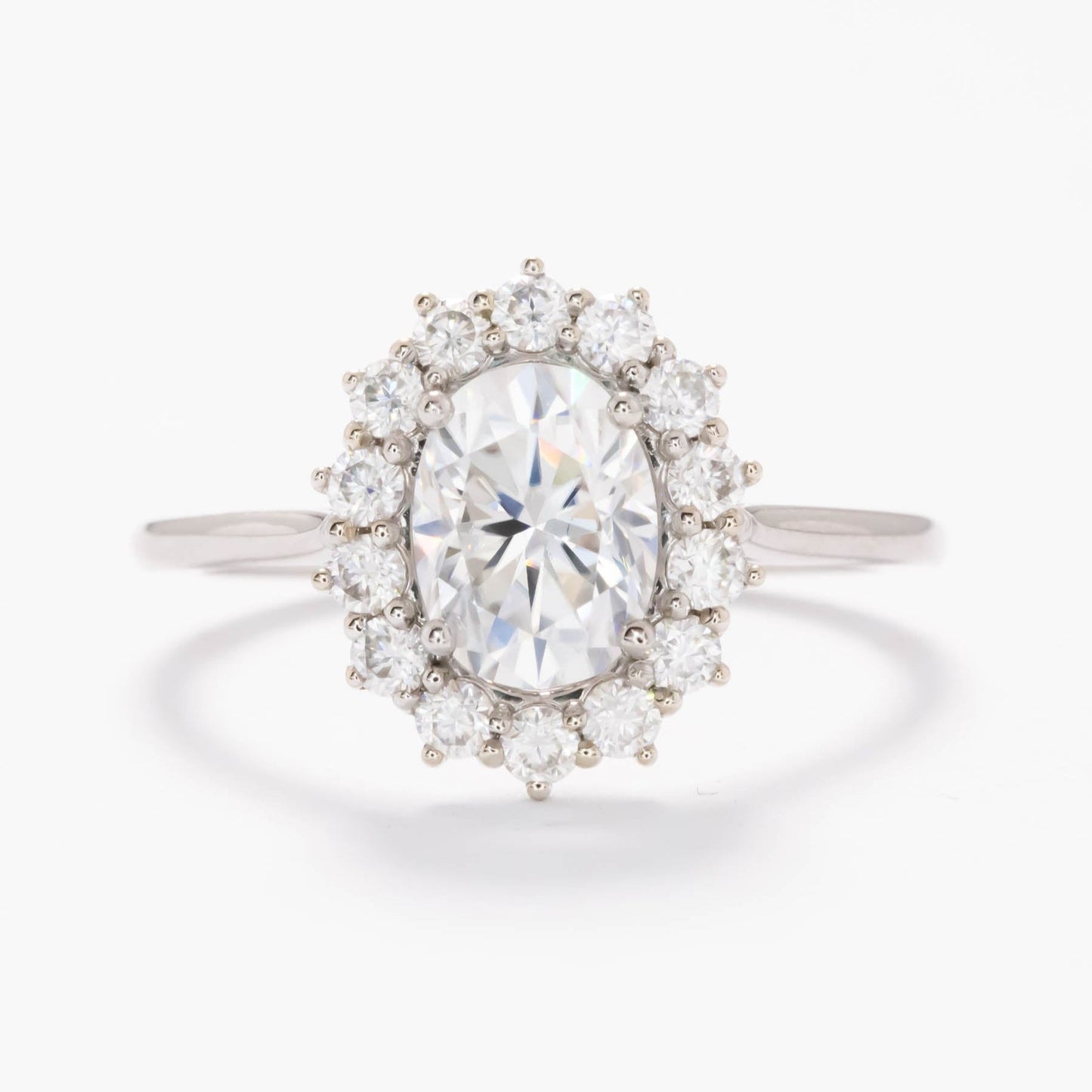 calypso halo engagement ring with white moissanite