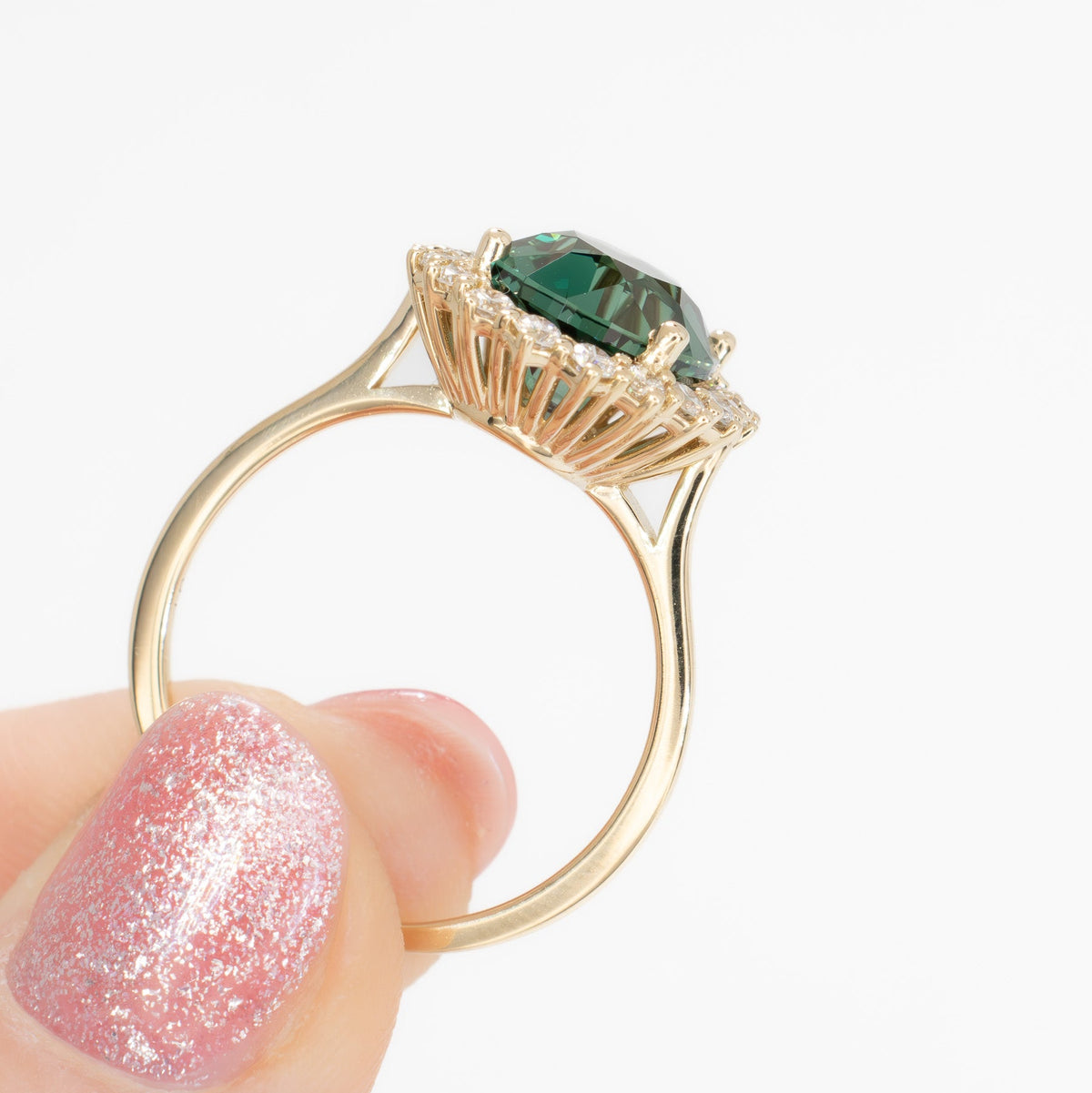 calypso halo ring in yellow gold with oval green lab sapphire