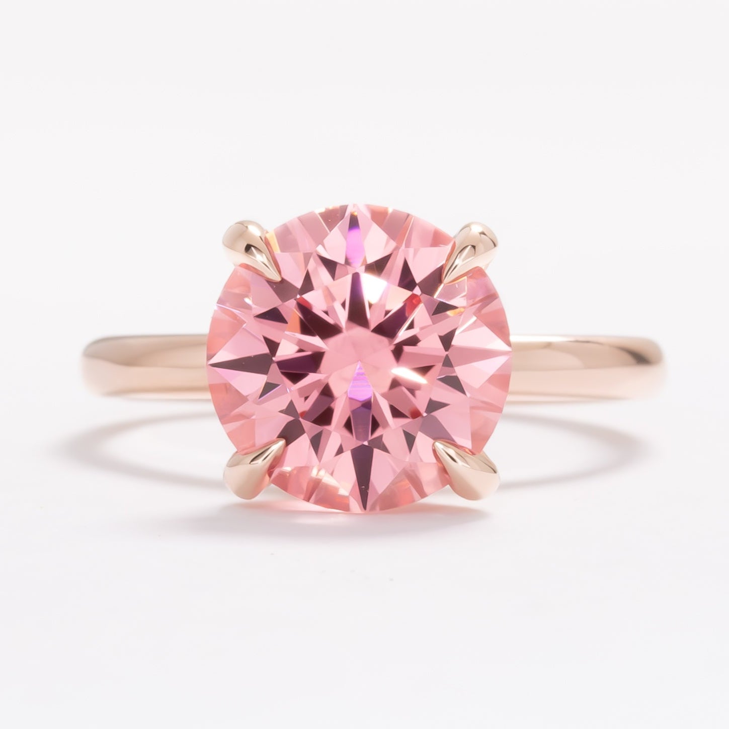 charmaine ring with round vivid pink lab sapphire