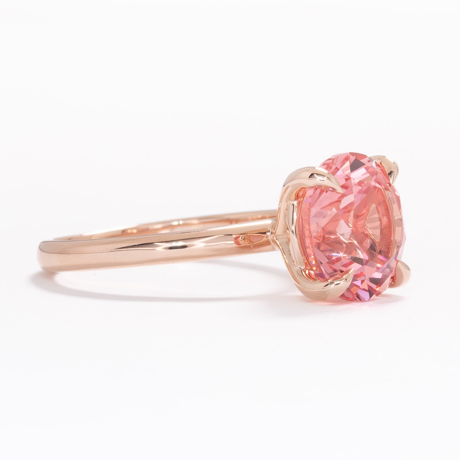 charmaine ring with round vivid pink lab sapphire