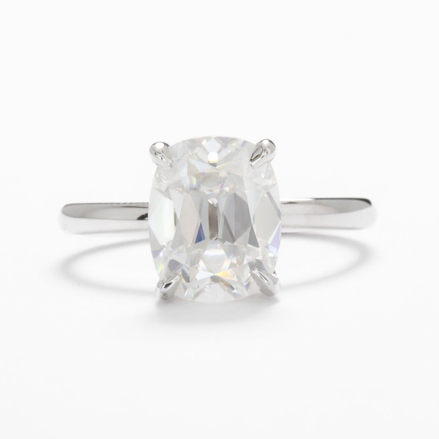 charmaine solitaire in white gold and moissanite