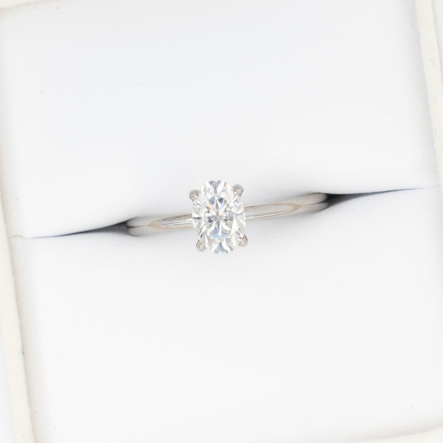 charmaine solitaire ring in white gold with oval white moissanite
