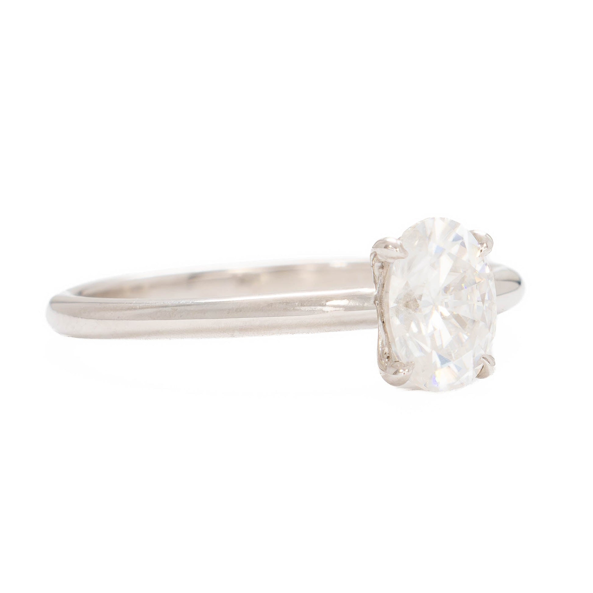 charmaine solitaire ring in white gold with oval white moissanite