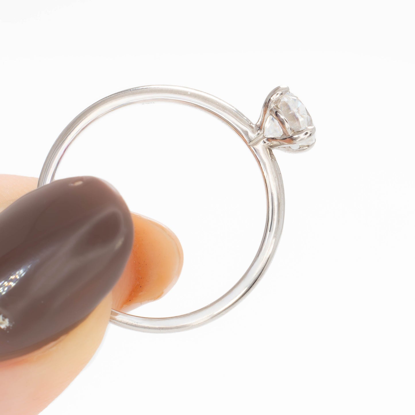 charmaine solitaire ring in white gold with oval white moissanite