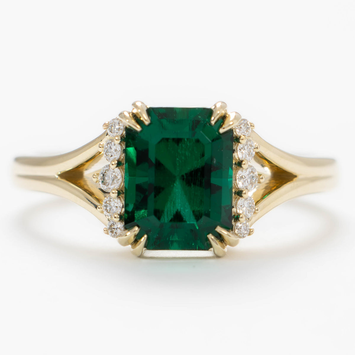 cindy accented split shank ring in yellow gold with radiant lab emerald