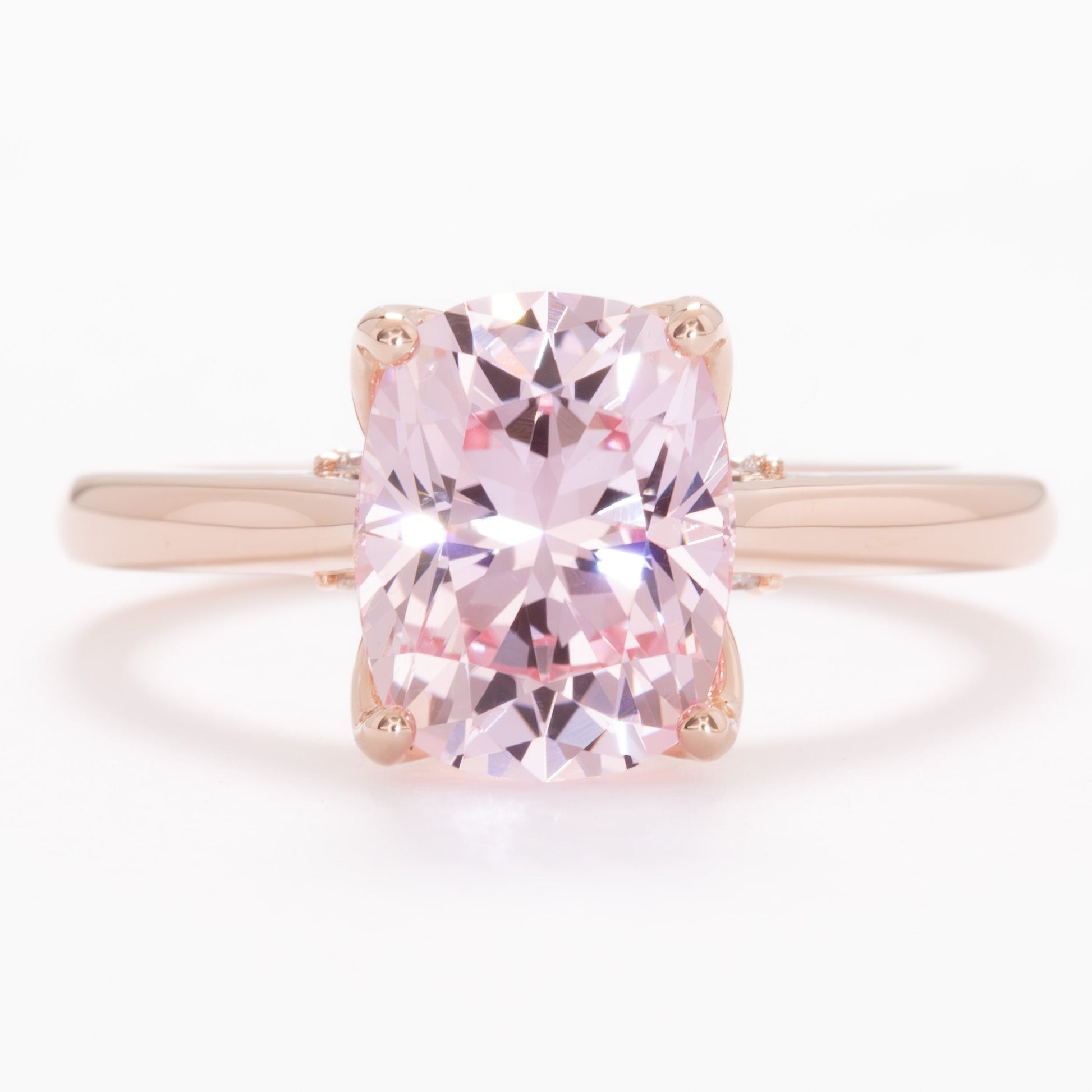 clover floral inspired engagement ring with peach lab sapphire