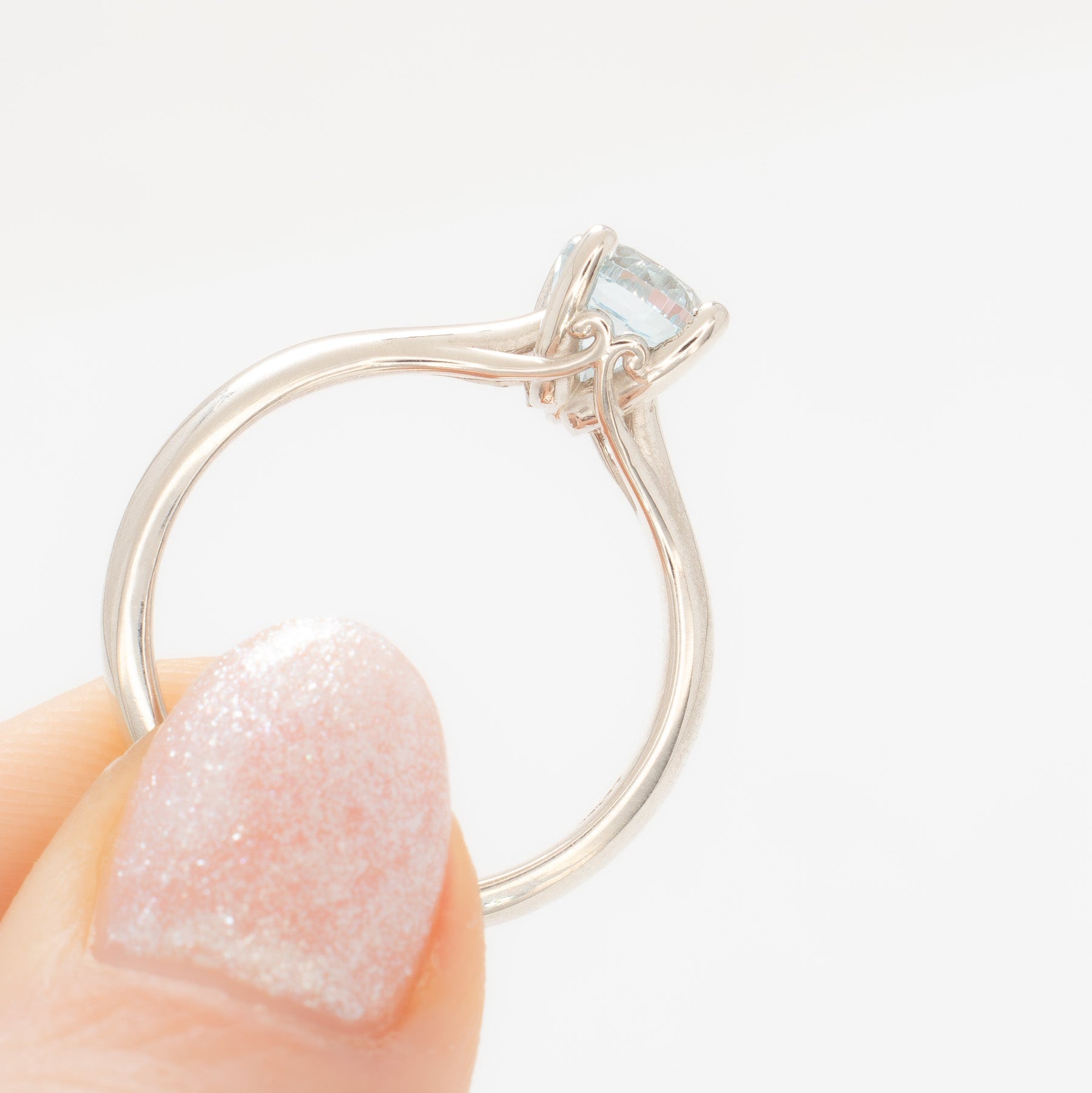 courtney solitaire ring with oval light blue lab sapphire