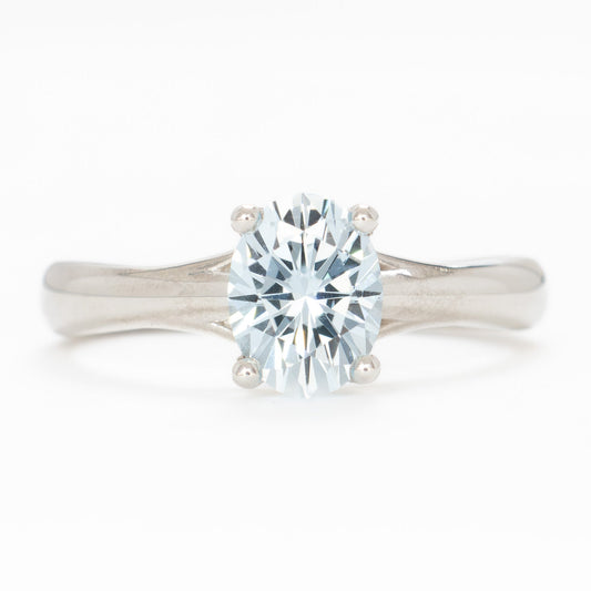 courtney solitaire ring with oval light blue lab sapphire