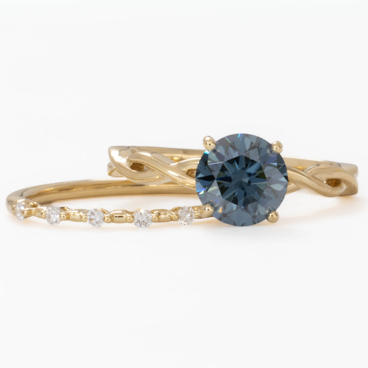cressida solitaire ring with round blue moissanite