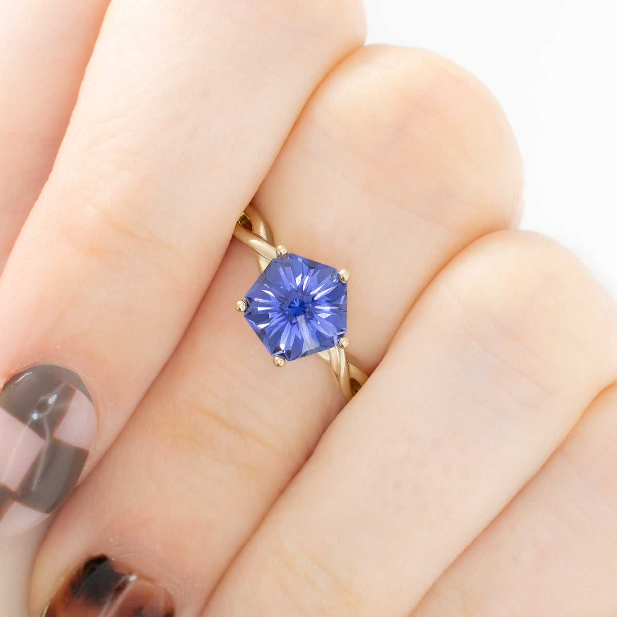 cressida solitaire ring with twisted band in yellow gold and hanami flower periwinkle blue lab sapphire