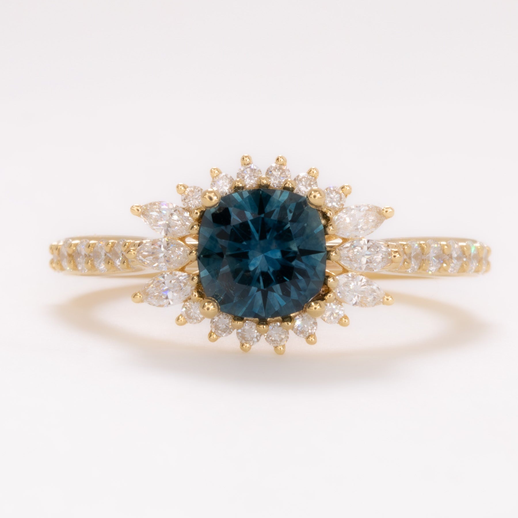 cushion montana sapphire halo wedding set in yellow gold