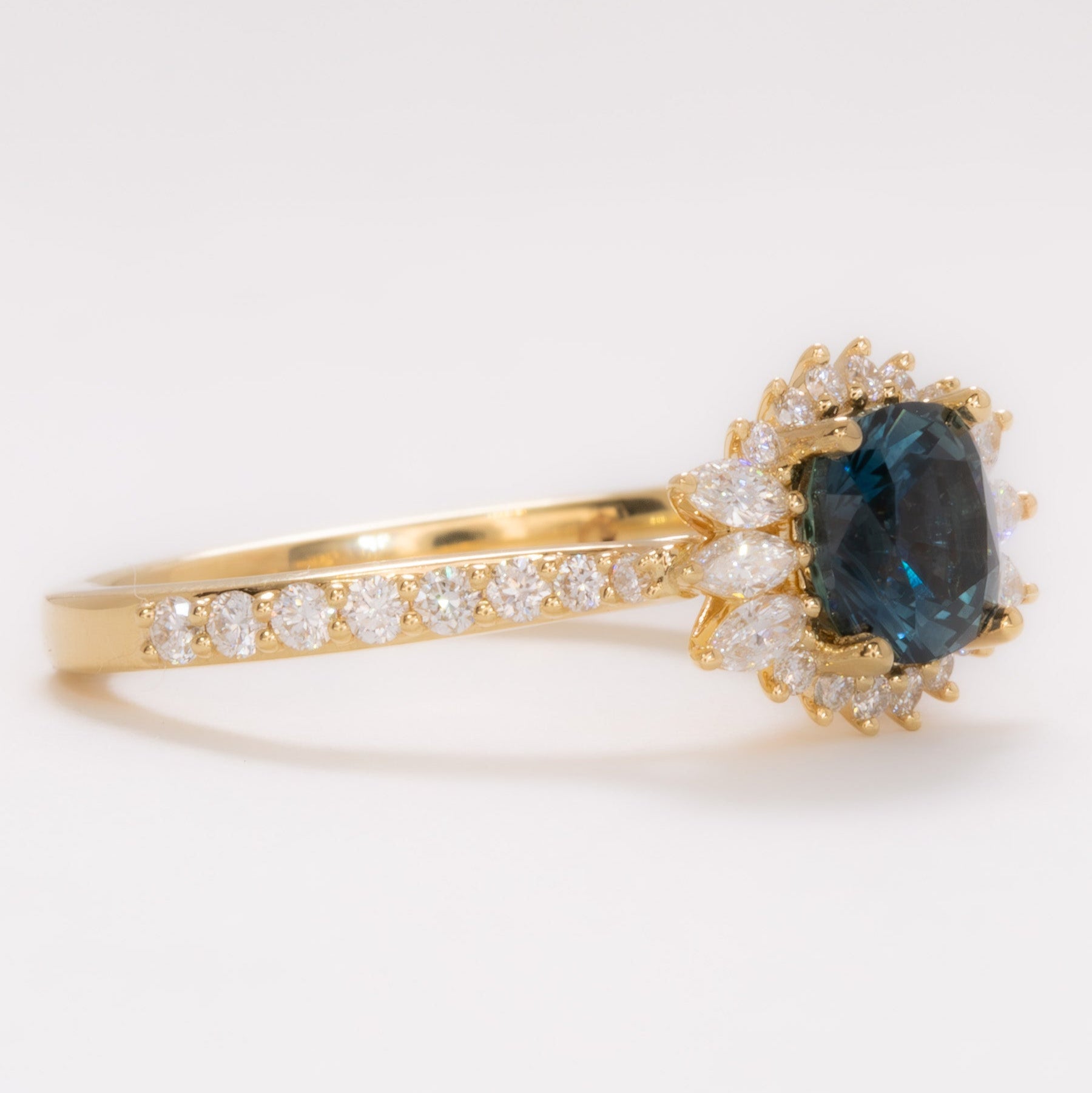 cushion montana sapphire halo wedding set in yellow gold