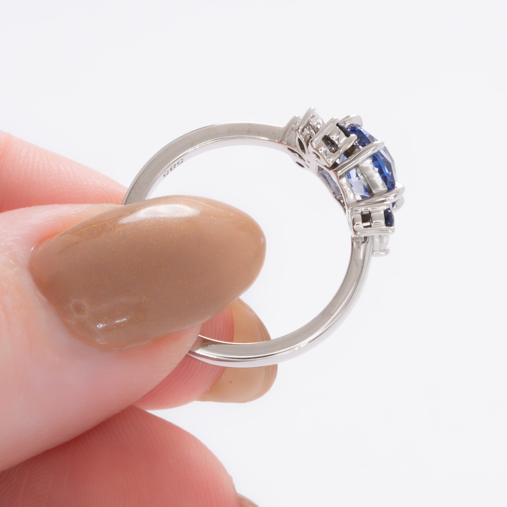 custom asymmetrical ring with hex cut blue lab sapphire