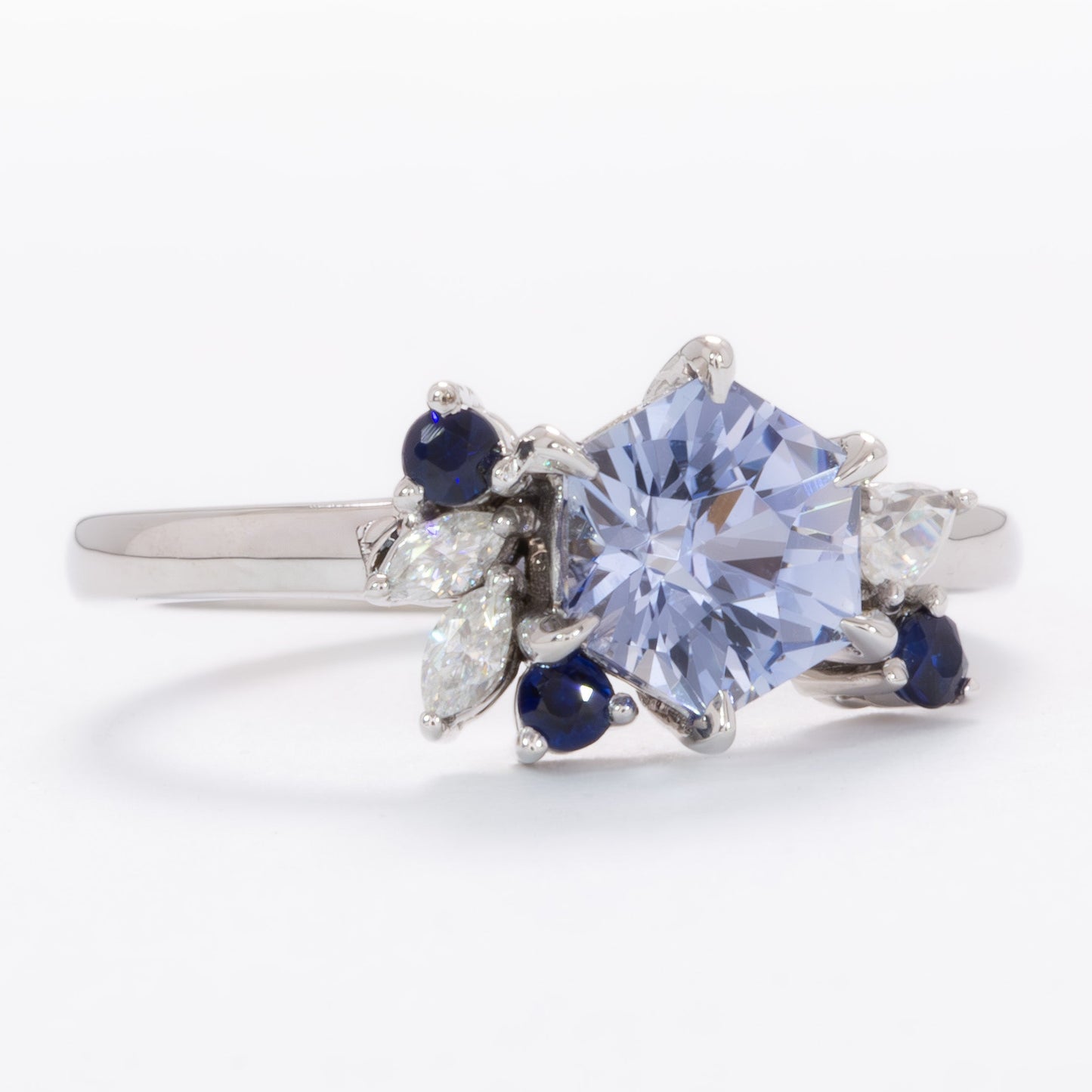 custom asymmetrical ring with hex cut blue lab sapphire
