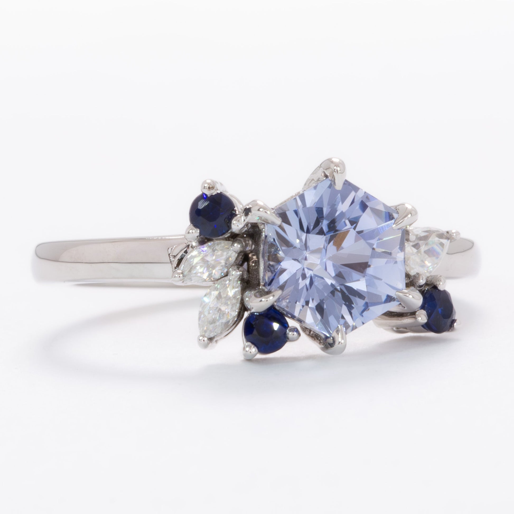custom asymmetrical ring with hex cut blue lab sapphire