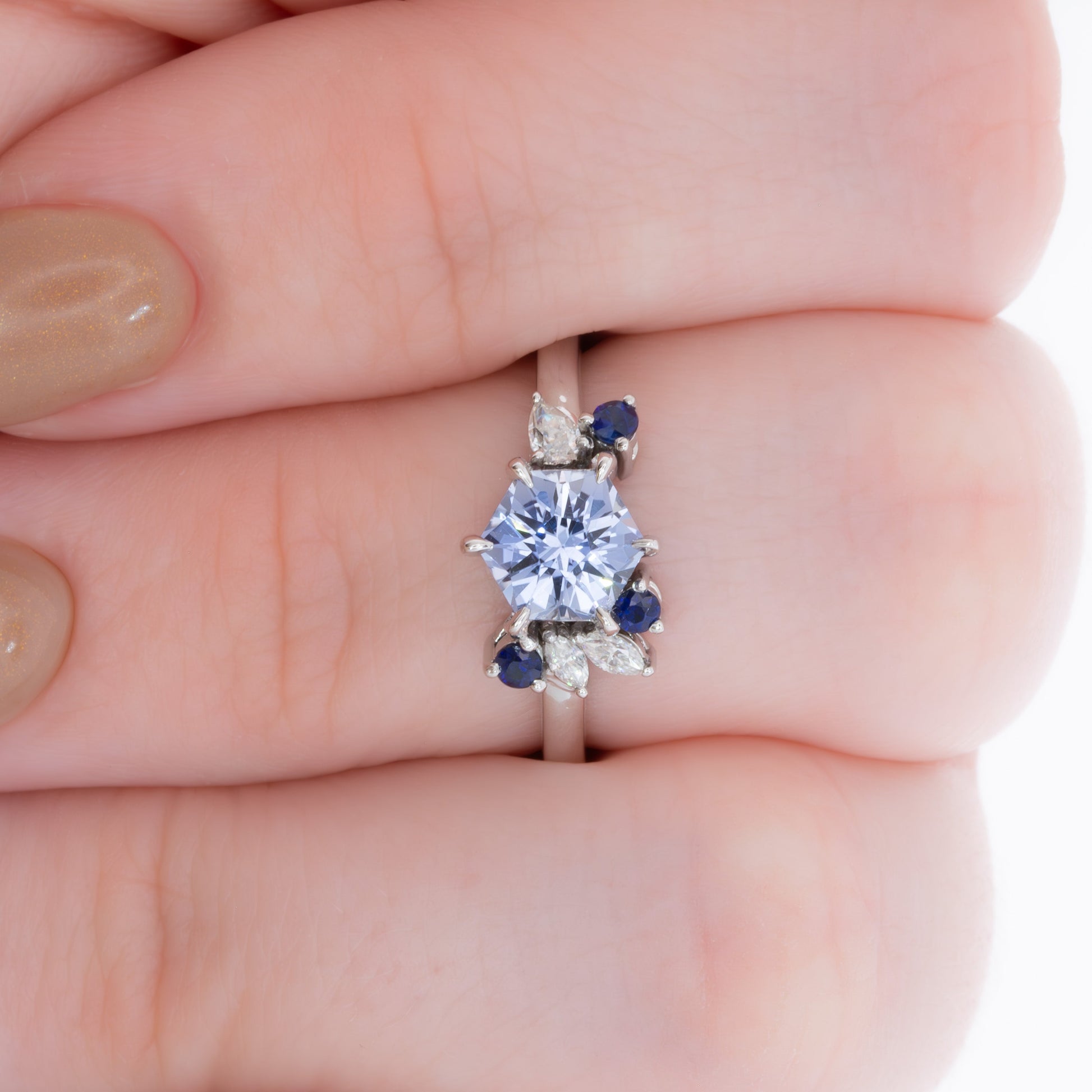 custom asymmetrical ring with hex cut blue lab sapphire