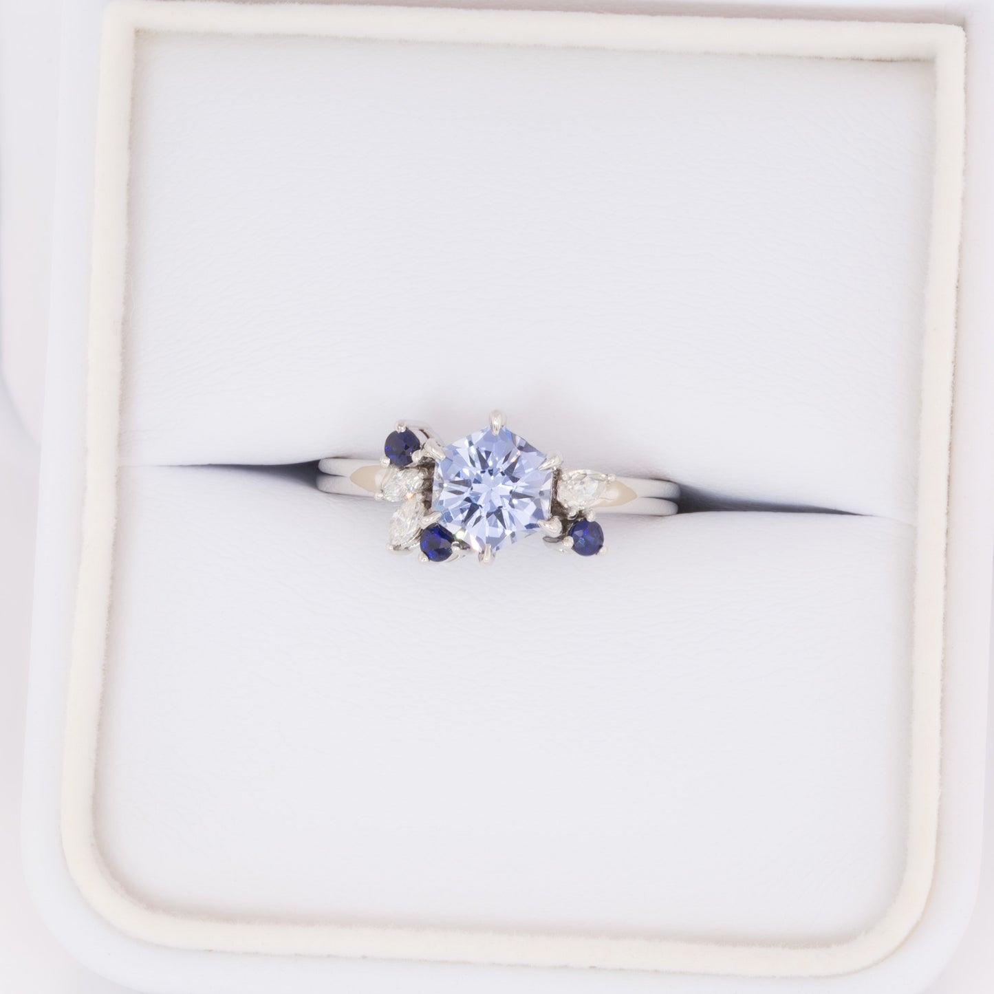 custom asymmetrical ring with hex cut blue lab sapphire