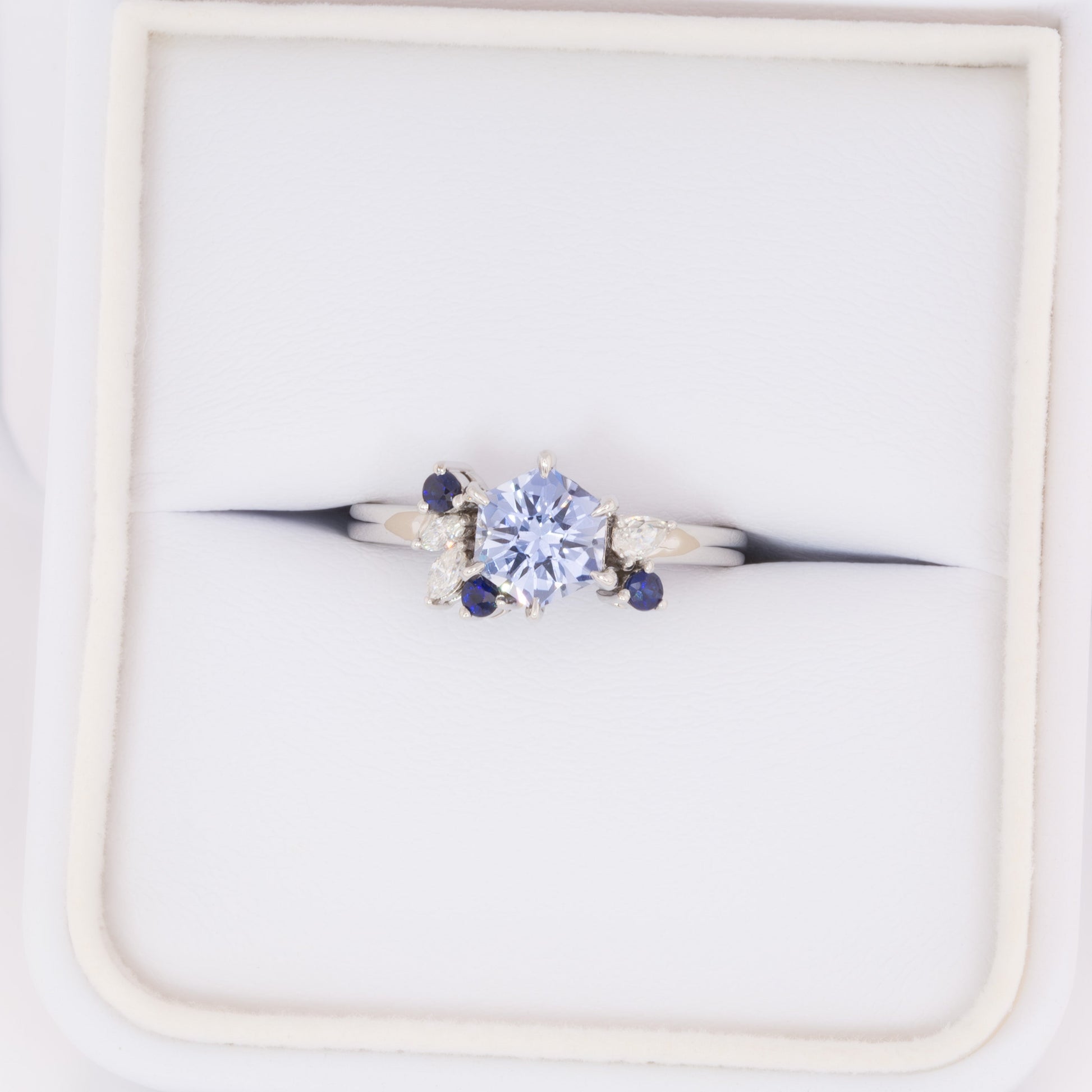 custom asymmetrical ring with hex cut blue lab sapphire