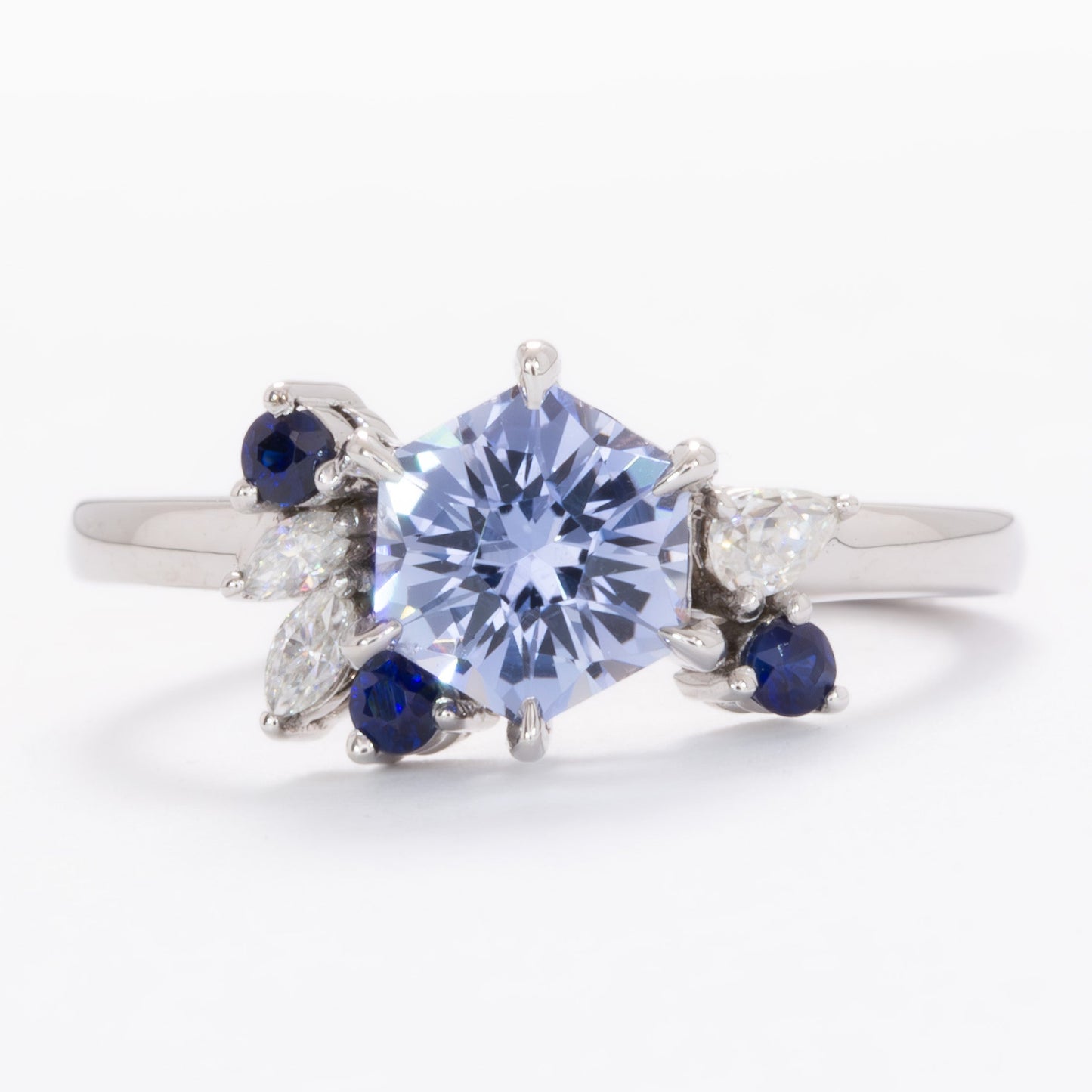 custom asymmetrical ring with hex cut blue lab sapphire
