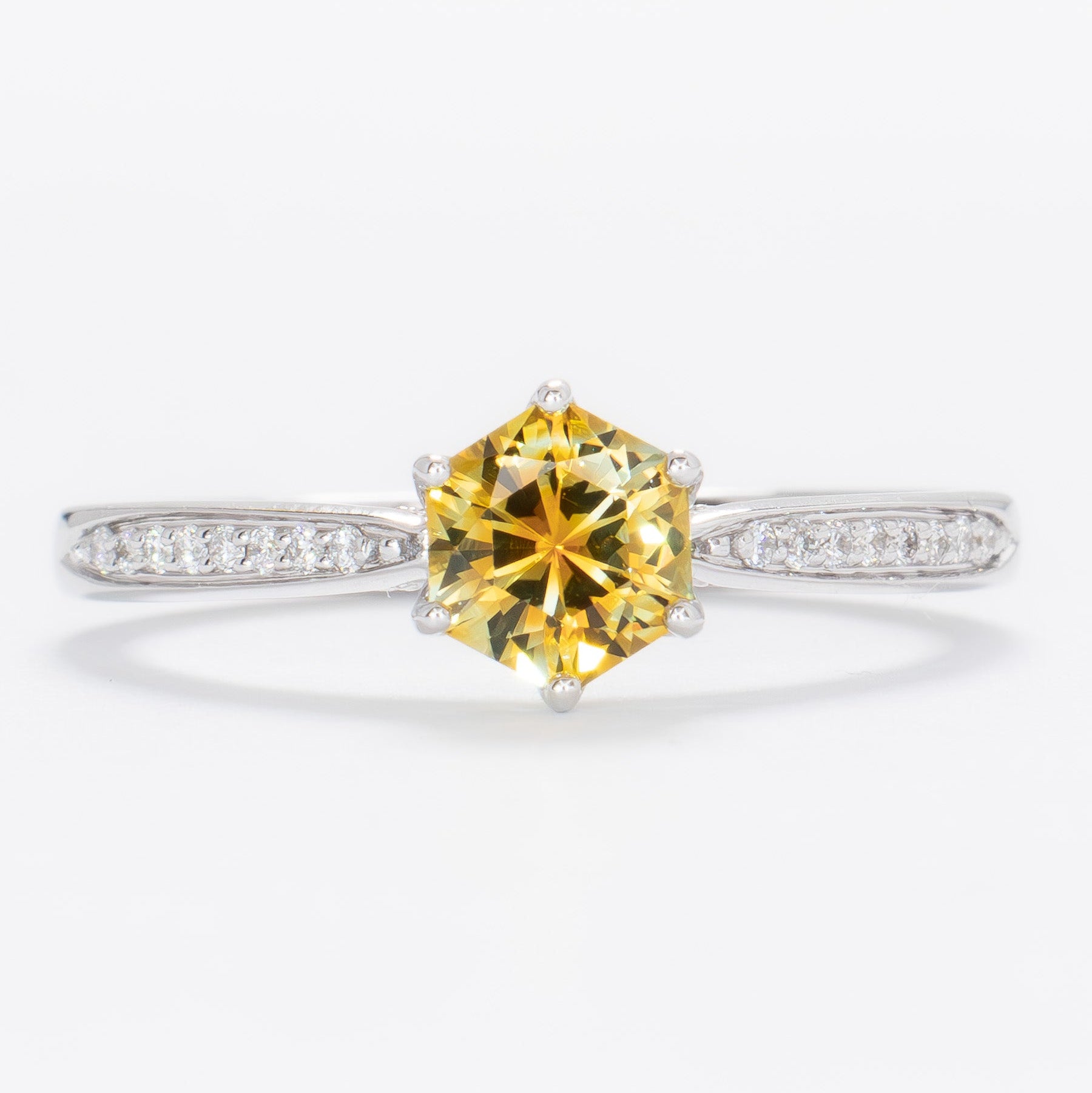custom engagement ring with hex cut yellow montana sapphire