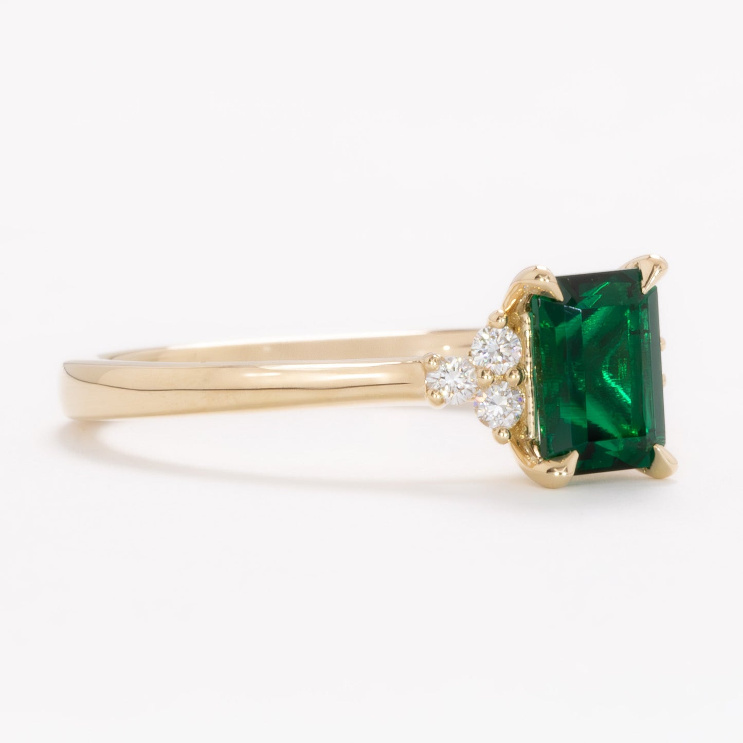 cynthia engagement ring with lab emerald step cut