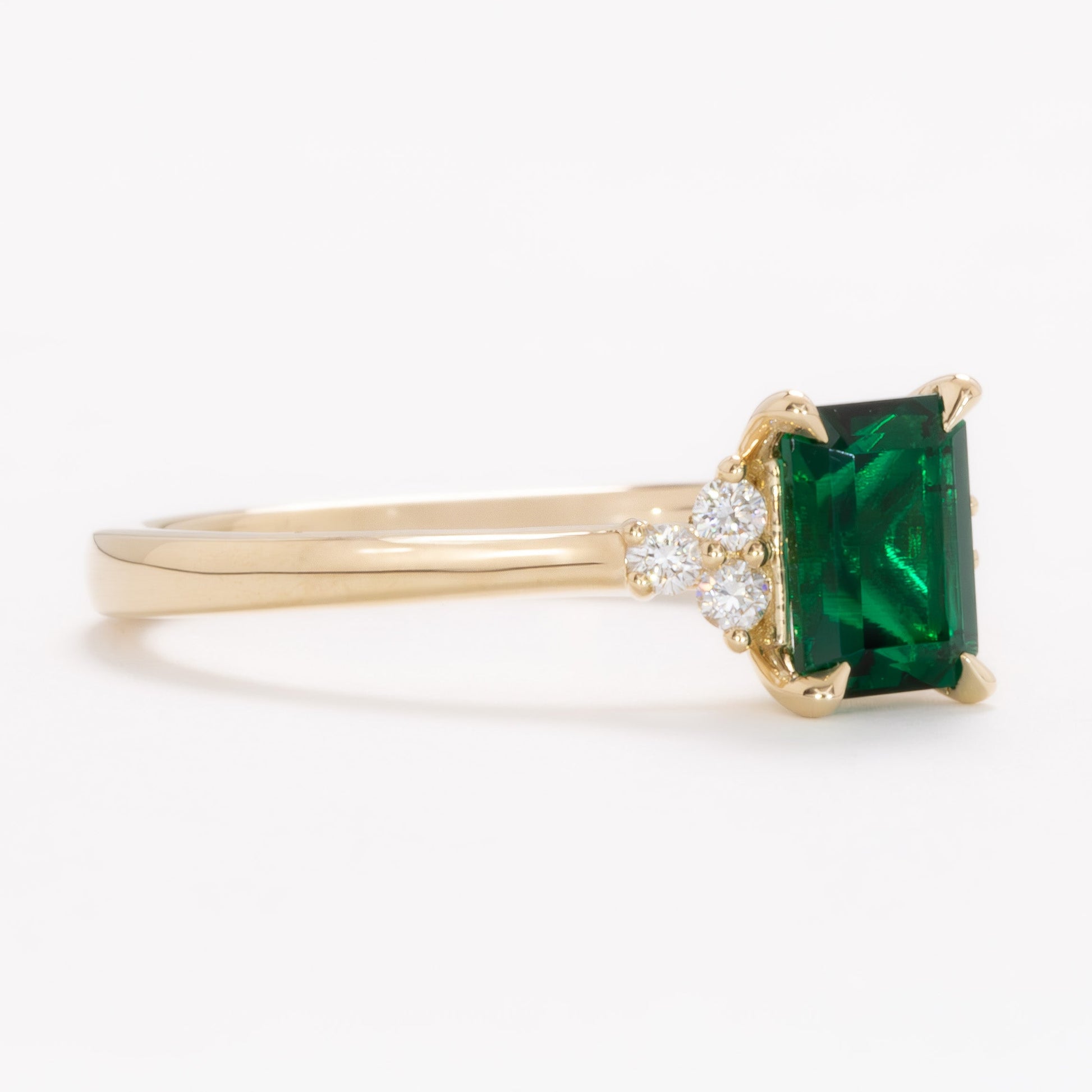 cynthia engagement ring with lab emerald step cut