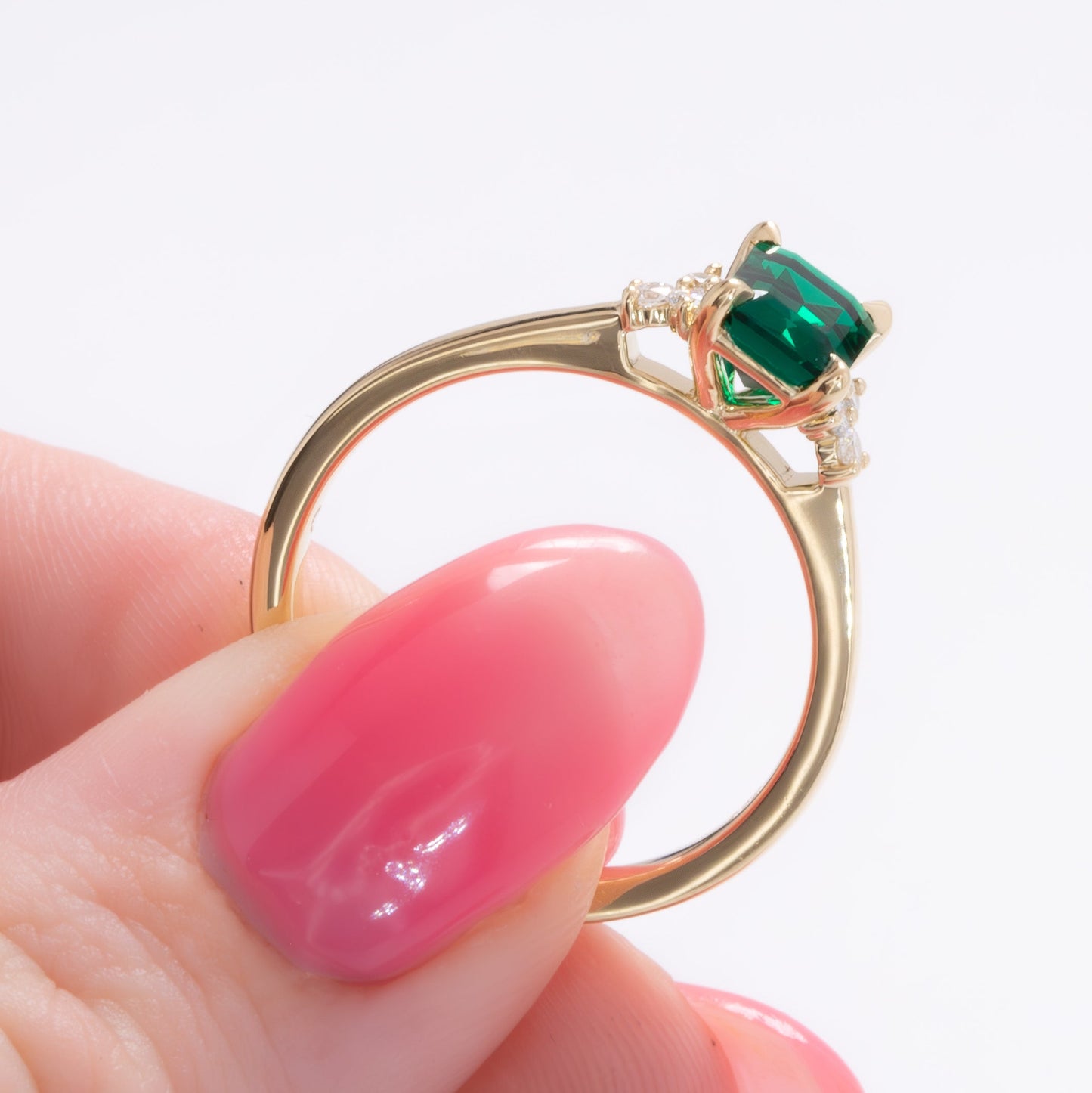 cynthia engagement ring with lab emerald step cut