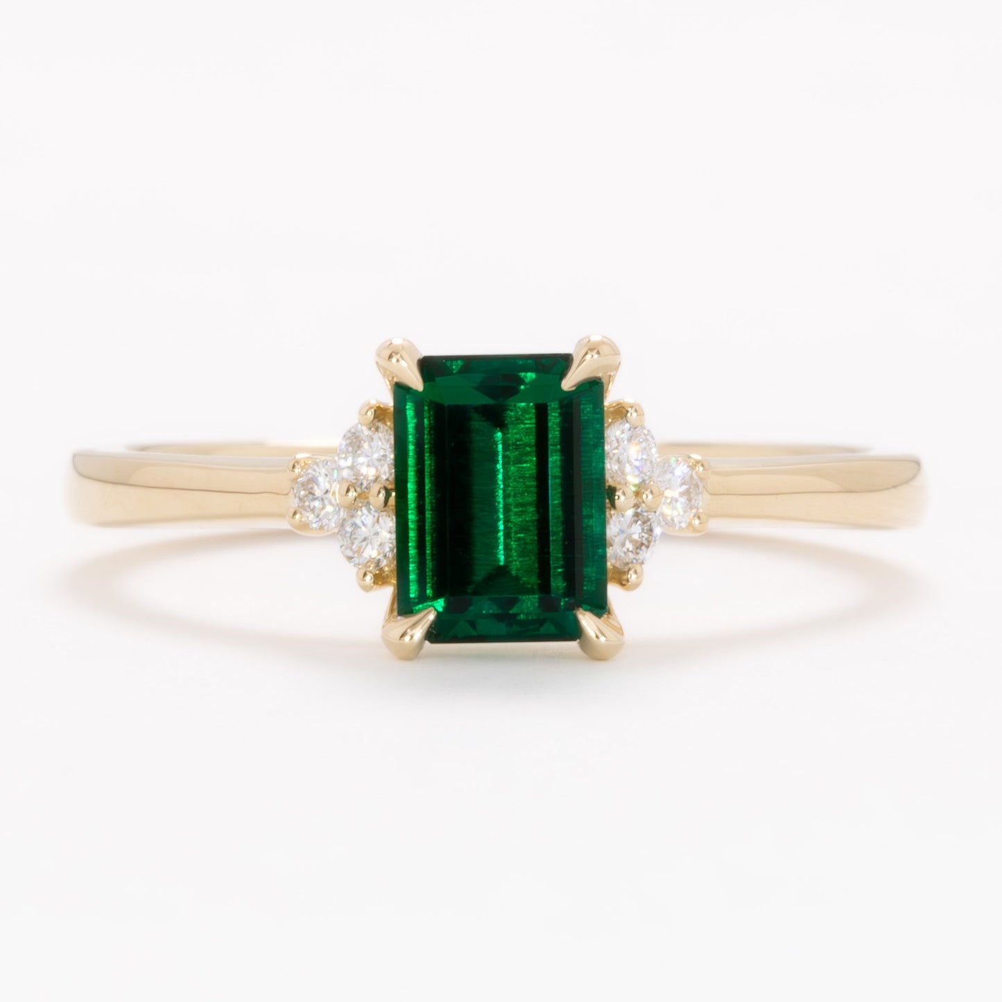 cynthia engagement ring with lab emerald step cut