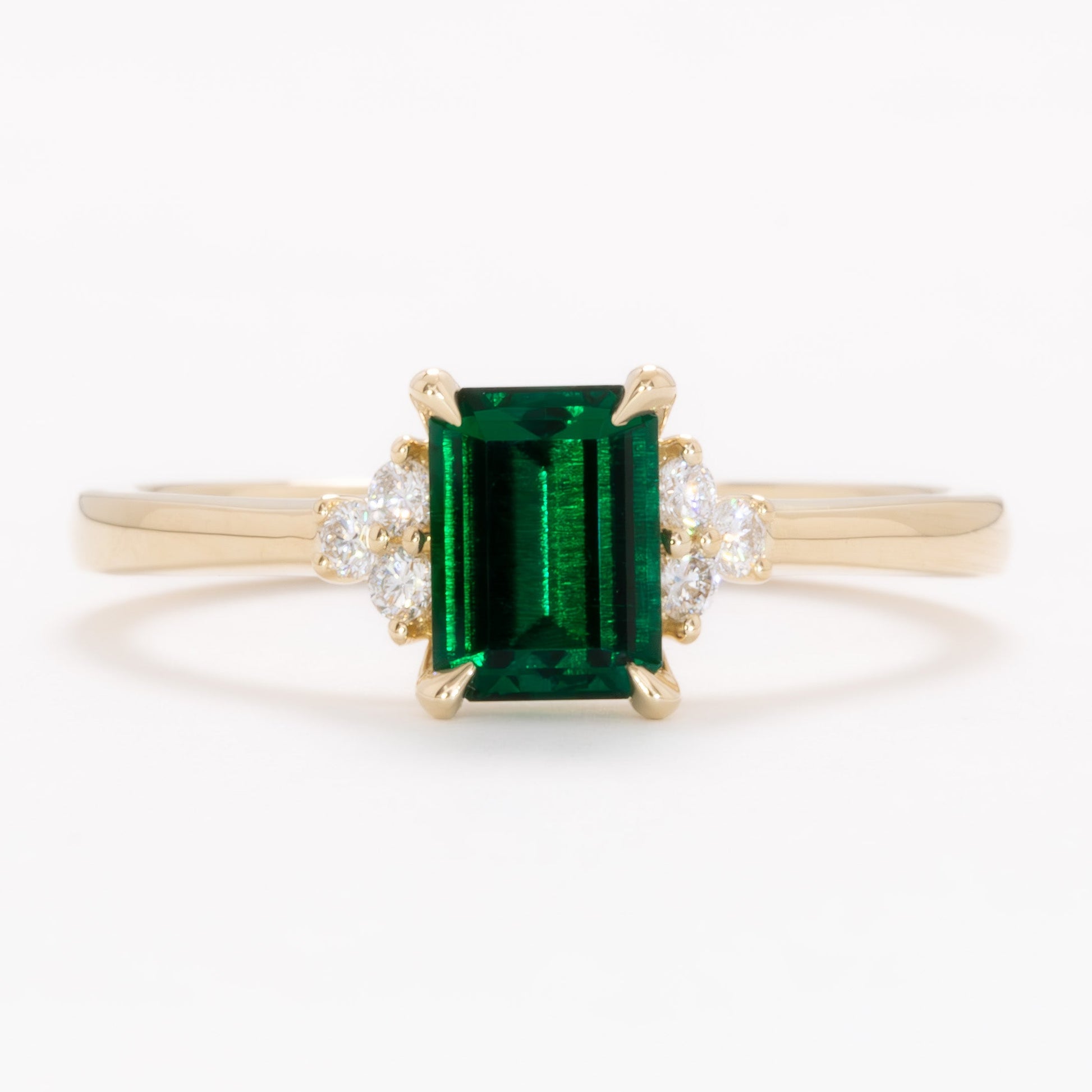 cynthia engagement ring with lab emerald step cut