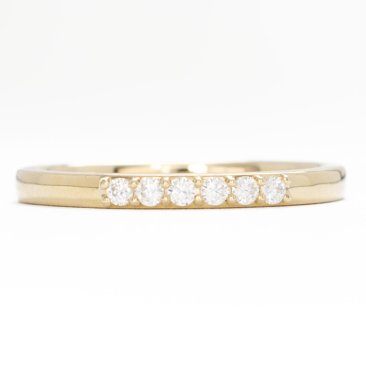 cynthia wedding band in yellow gold and moissanite