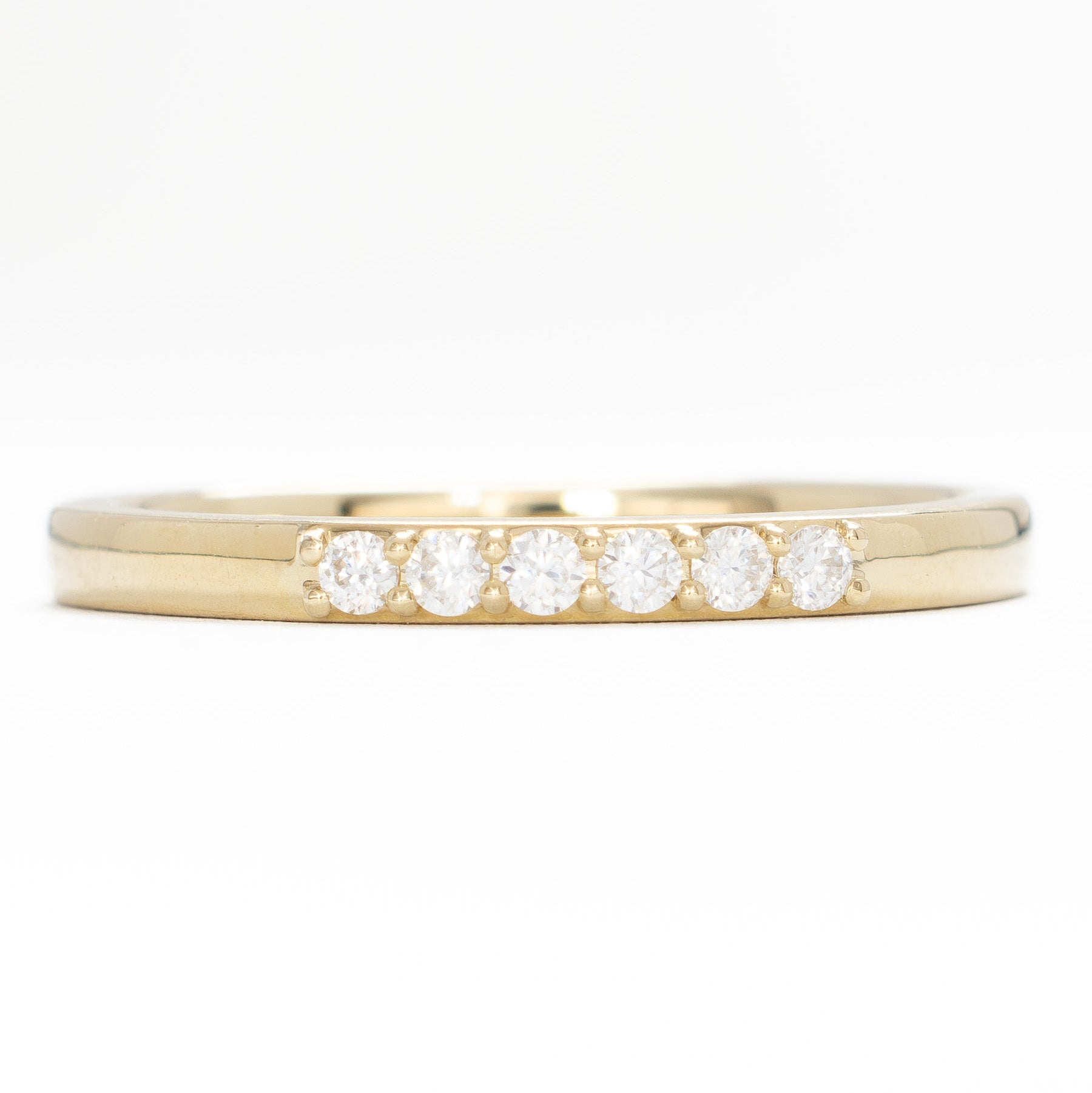 cynthia wedding band in yellow gold and moissanite