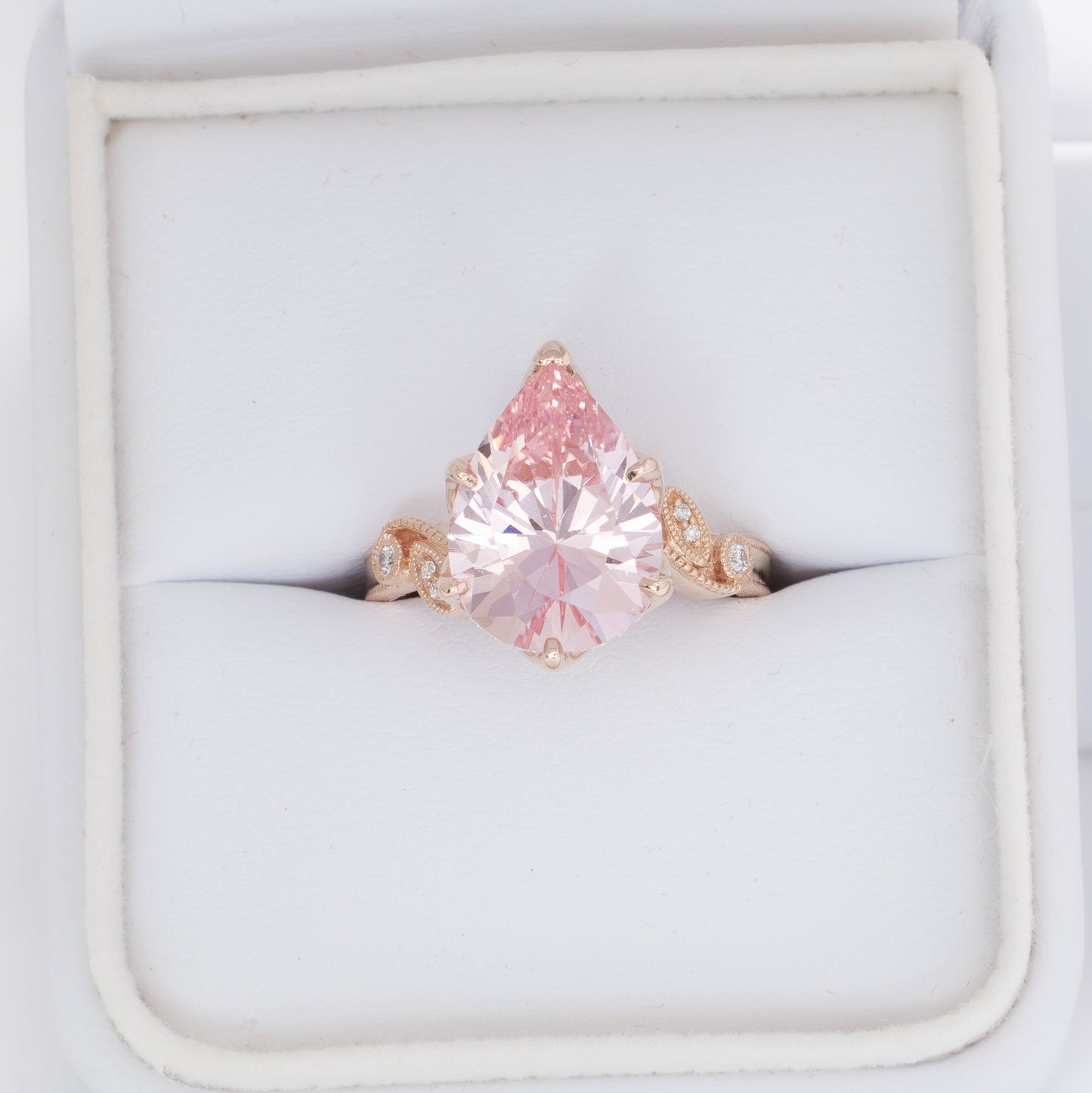 dahlia rose gold engagement ring with pink lab sapphire pear