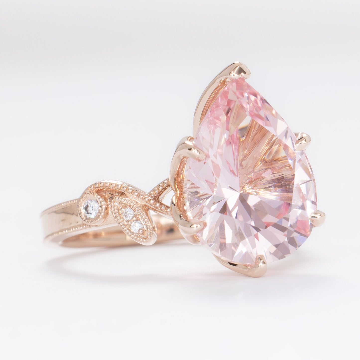 dahlia rose gold engagement ring with pink lab sapphire pear