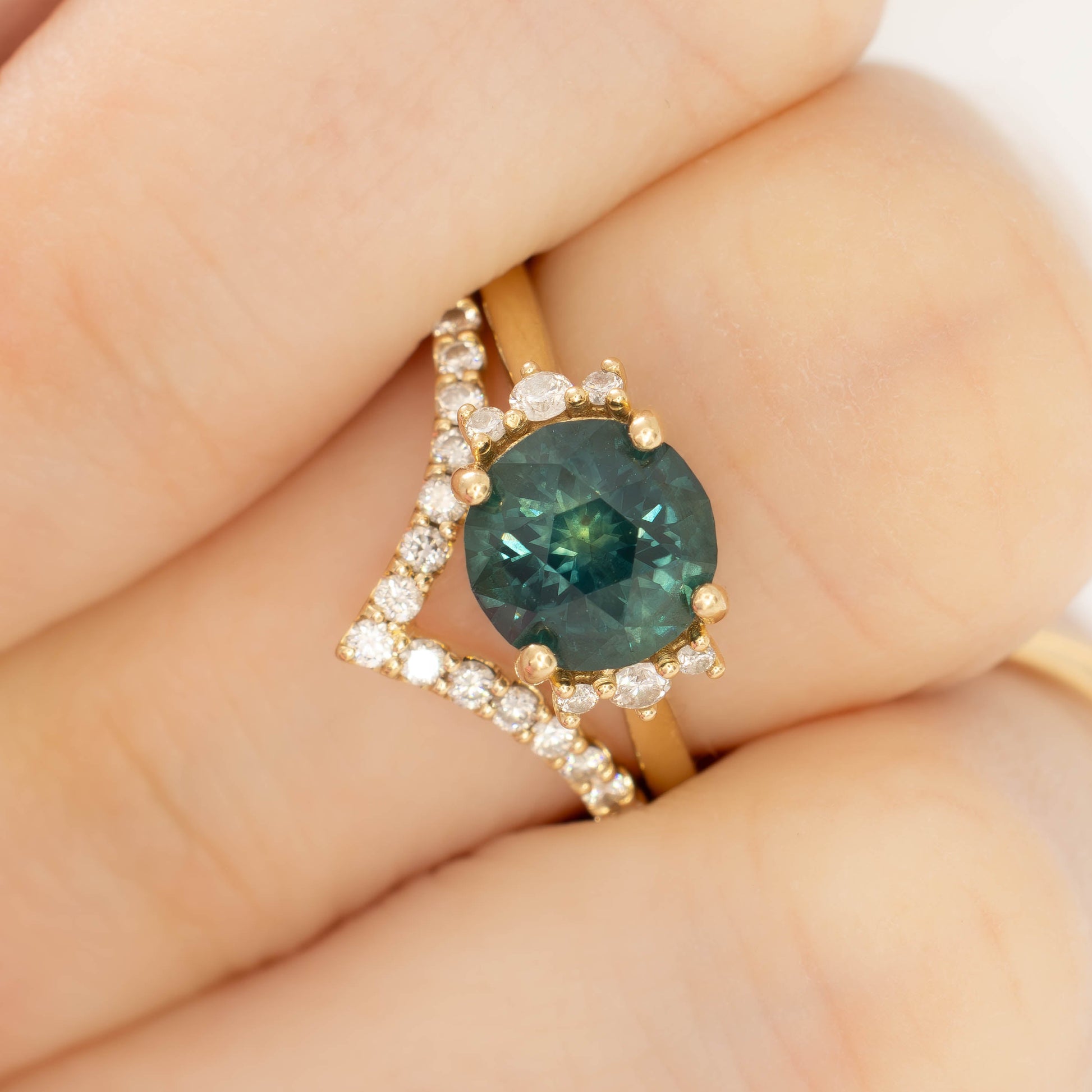 eclipse accented engagement ring with round  blue-green montana sapphire