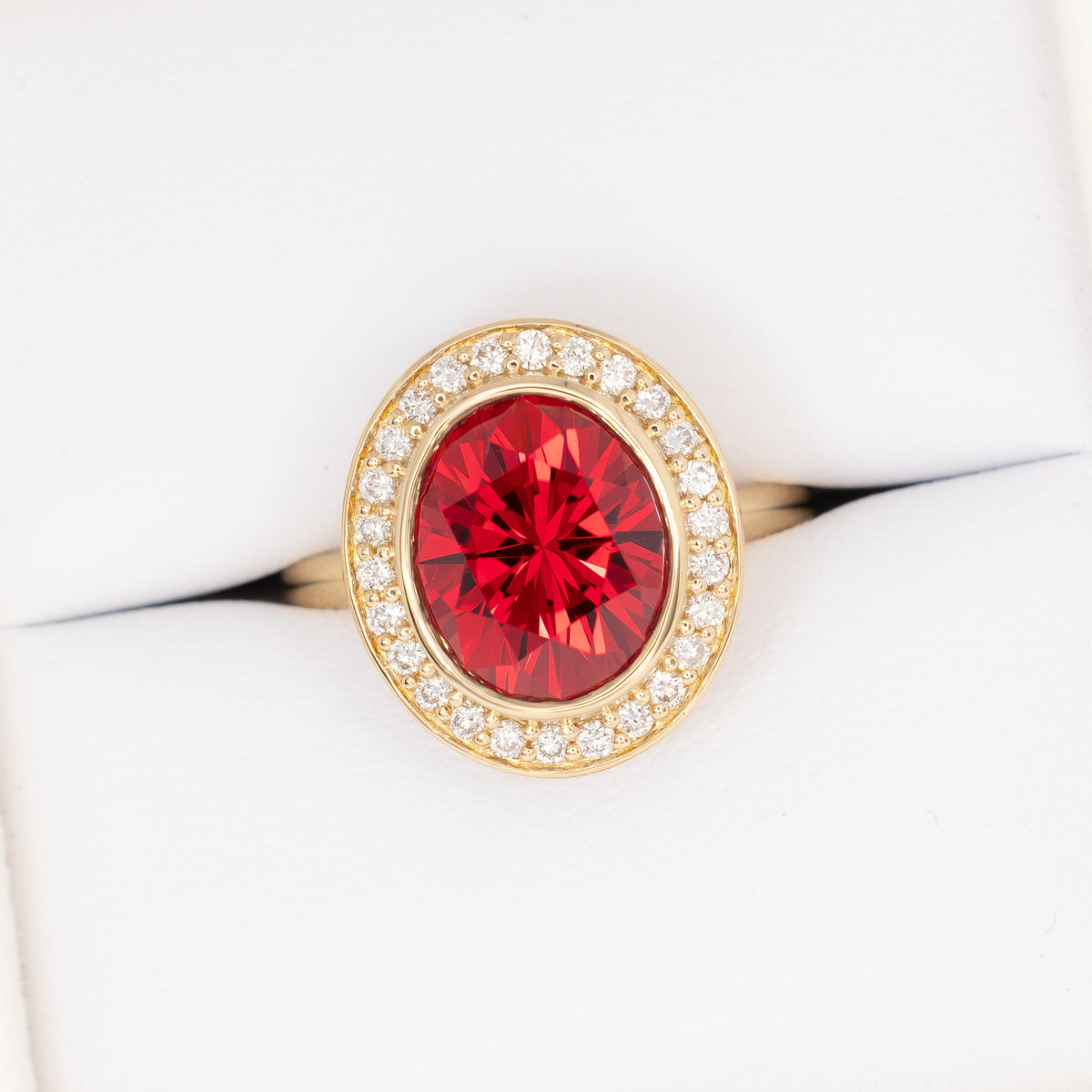 eleanor art deco halo ring in yellow gold with oval lab ruby