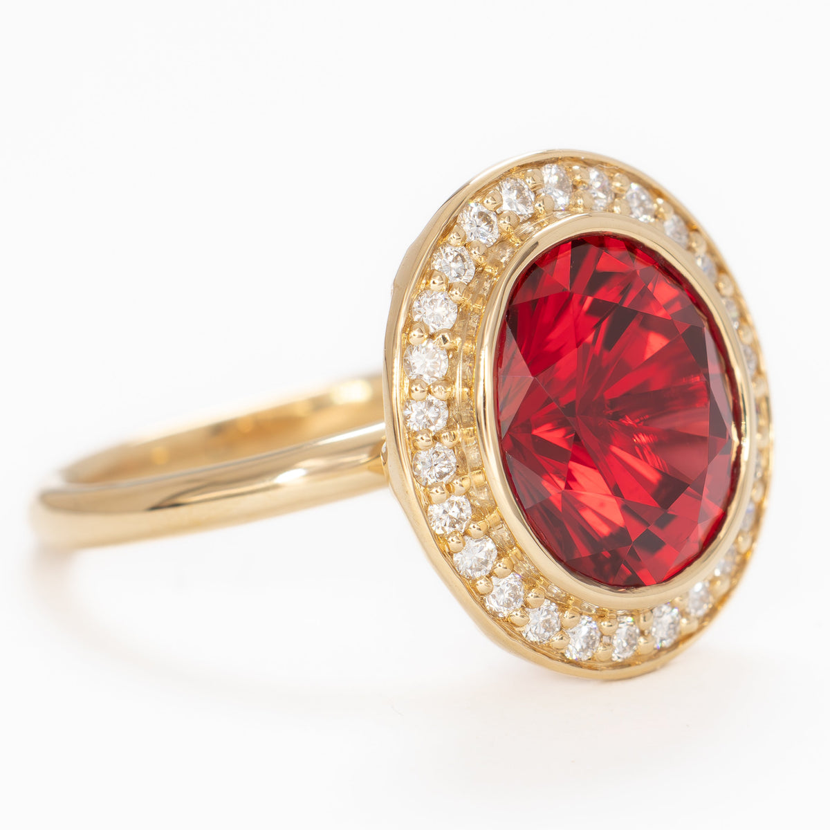 eleanor art deco halo ring in yellow gold with oval lab ruby