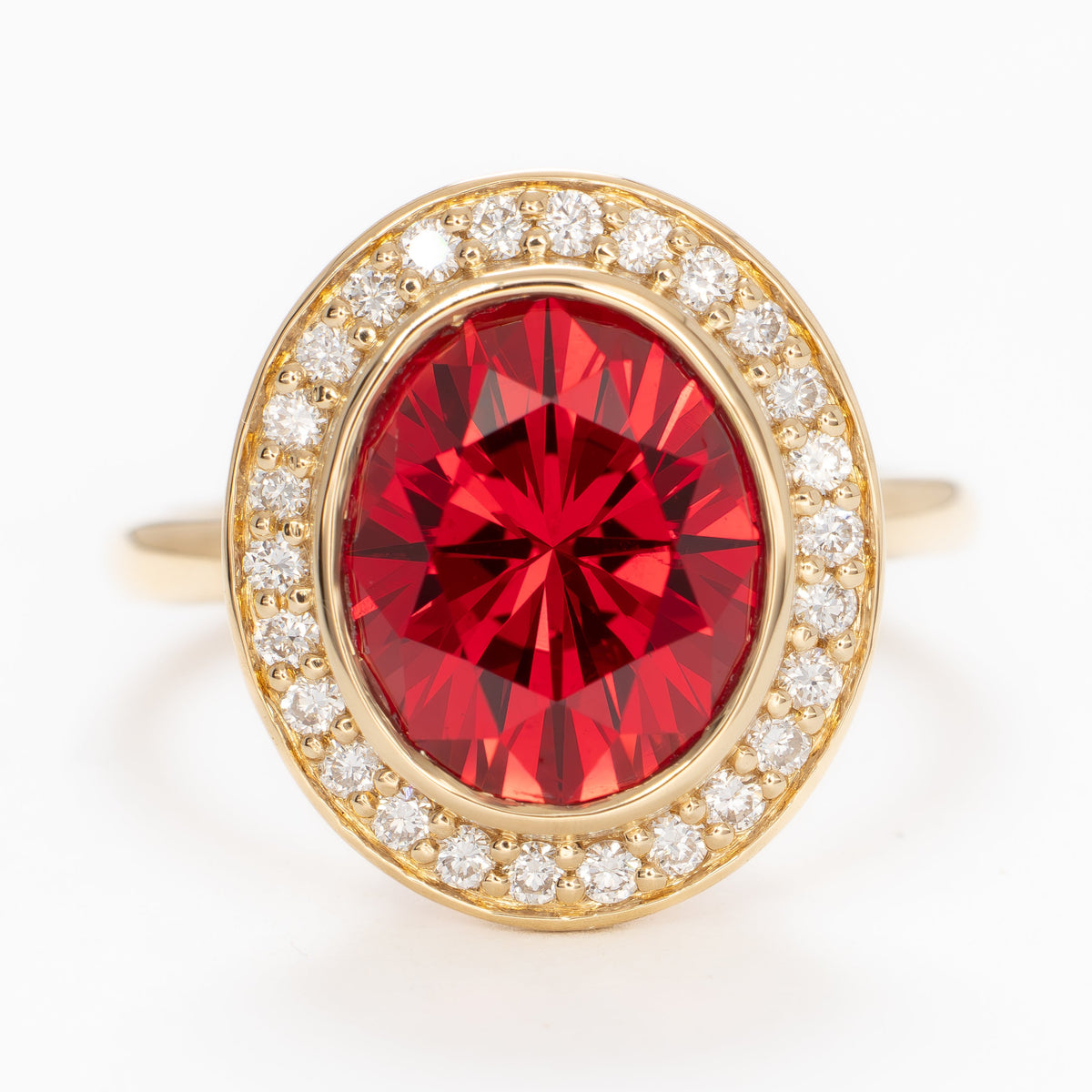 eleanor art deco halo ring in yellow gold with oval lab ruby