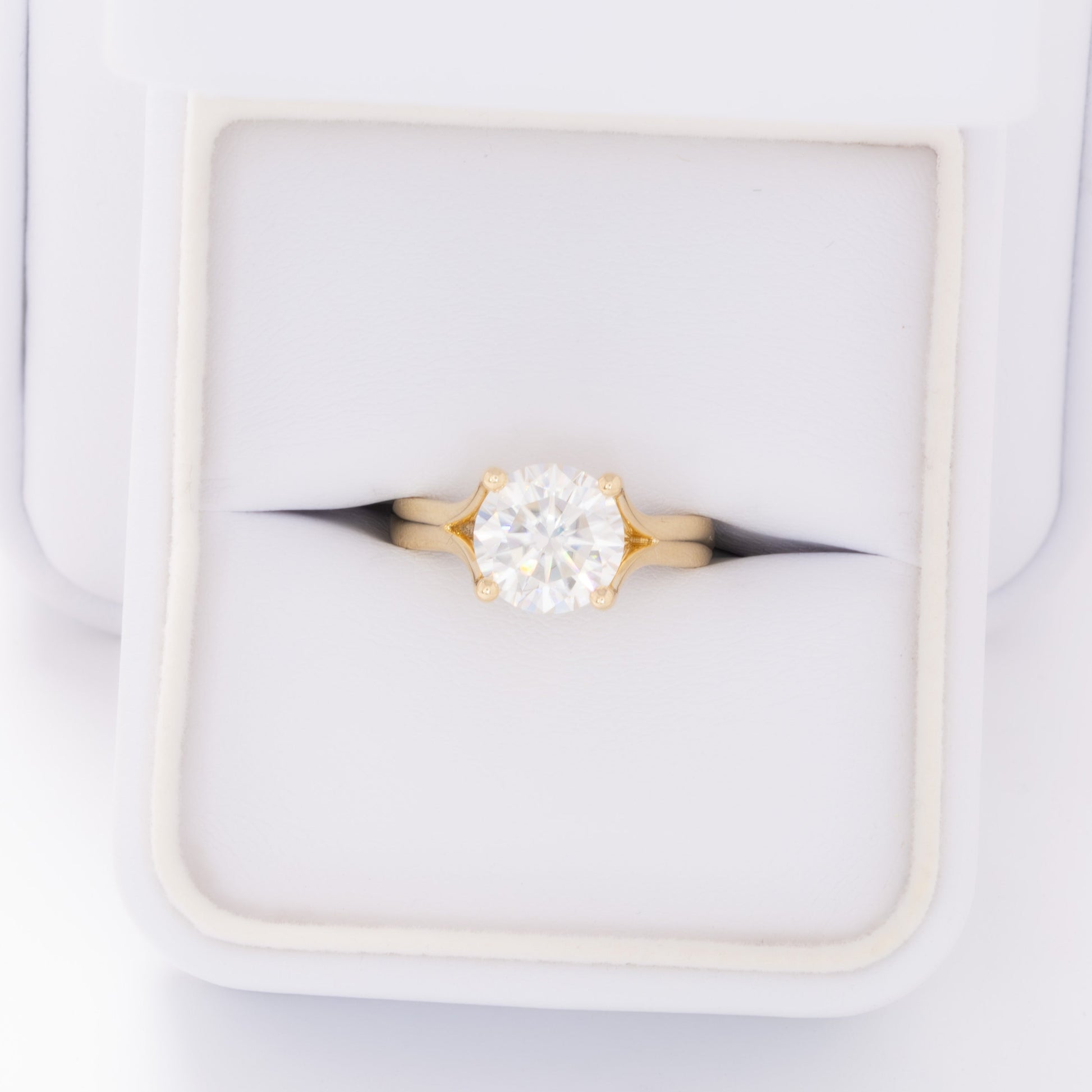 elin solitaire engagement ring with round moissanite