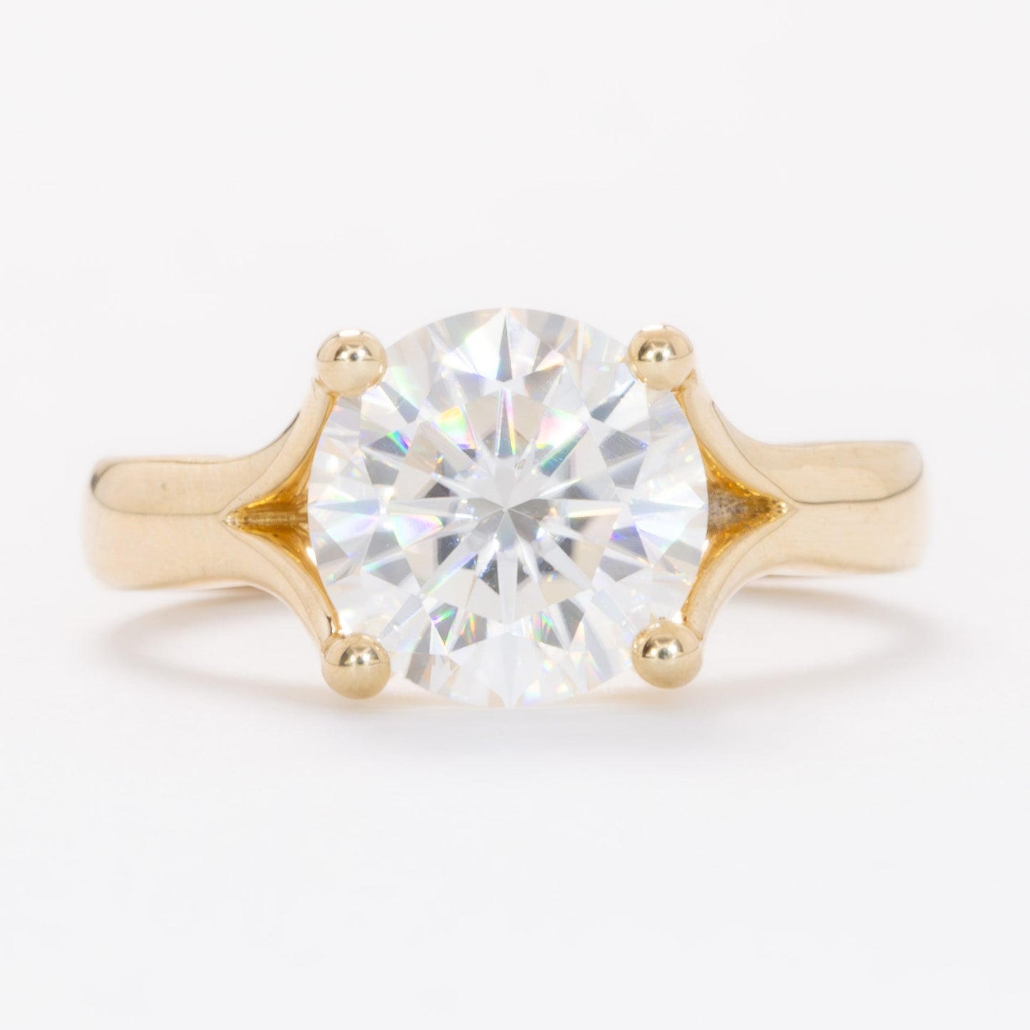 elin solitaire engagement ring with round moissanite