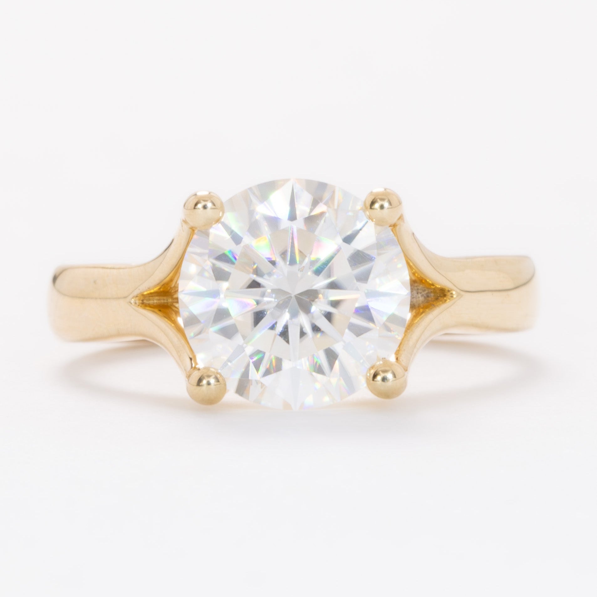 elin solitaire engagement ring with round moissanite