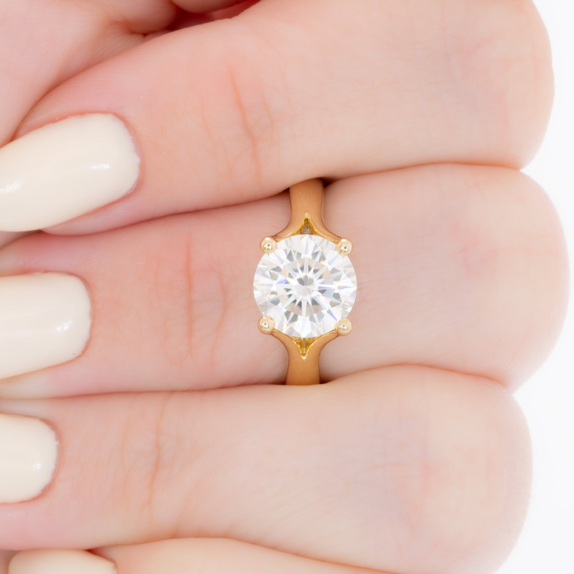 elin solitaire engagement ring with round moissanite