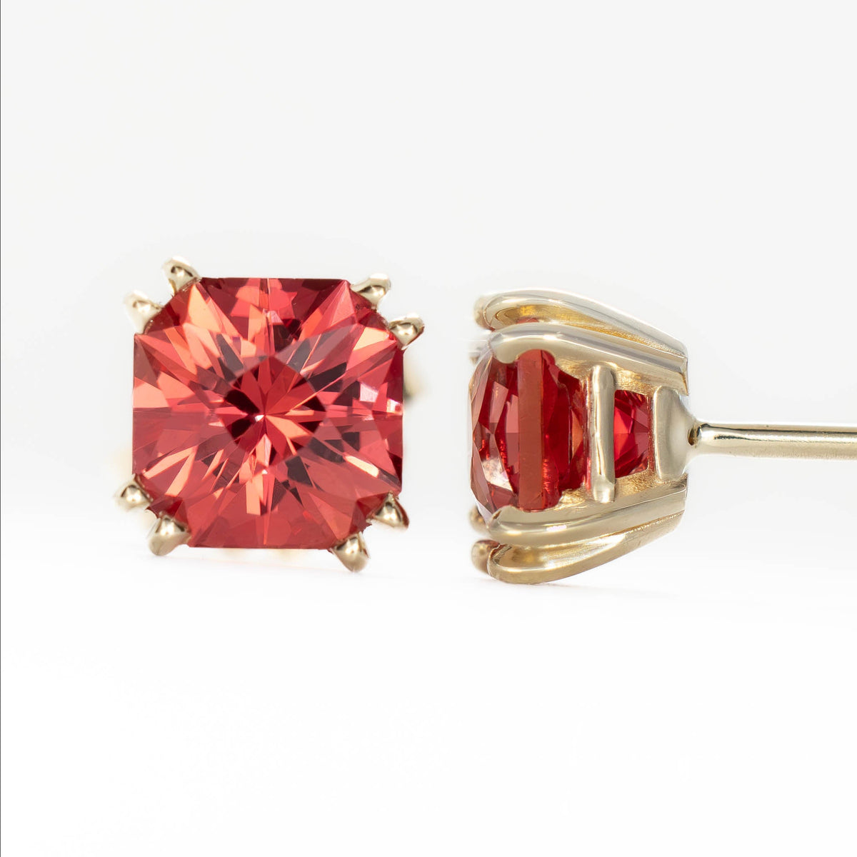 emma earrings in yellow gold with lab ruby asschers