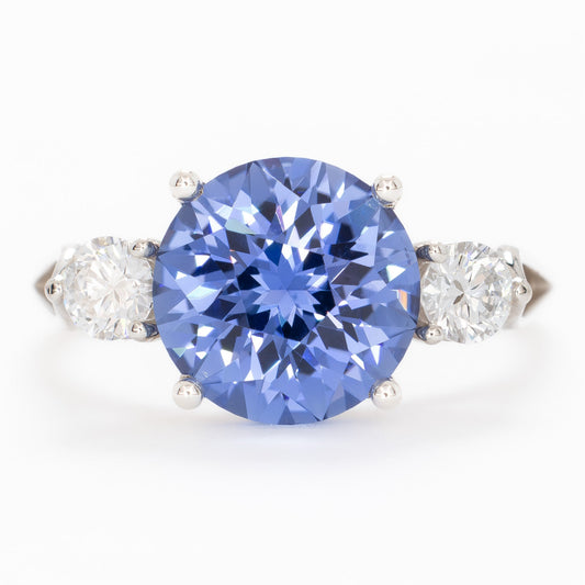 emryn three stone ring with round periwinkle blue lab sapphire