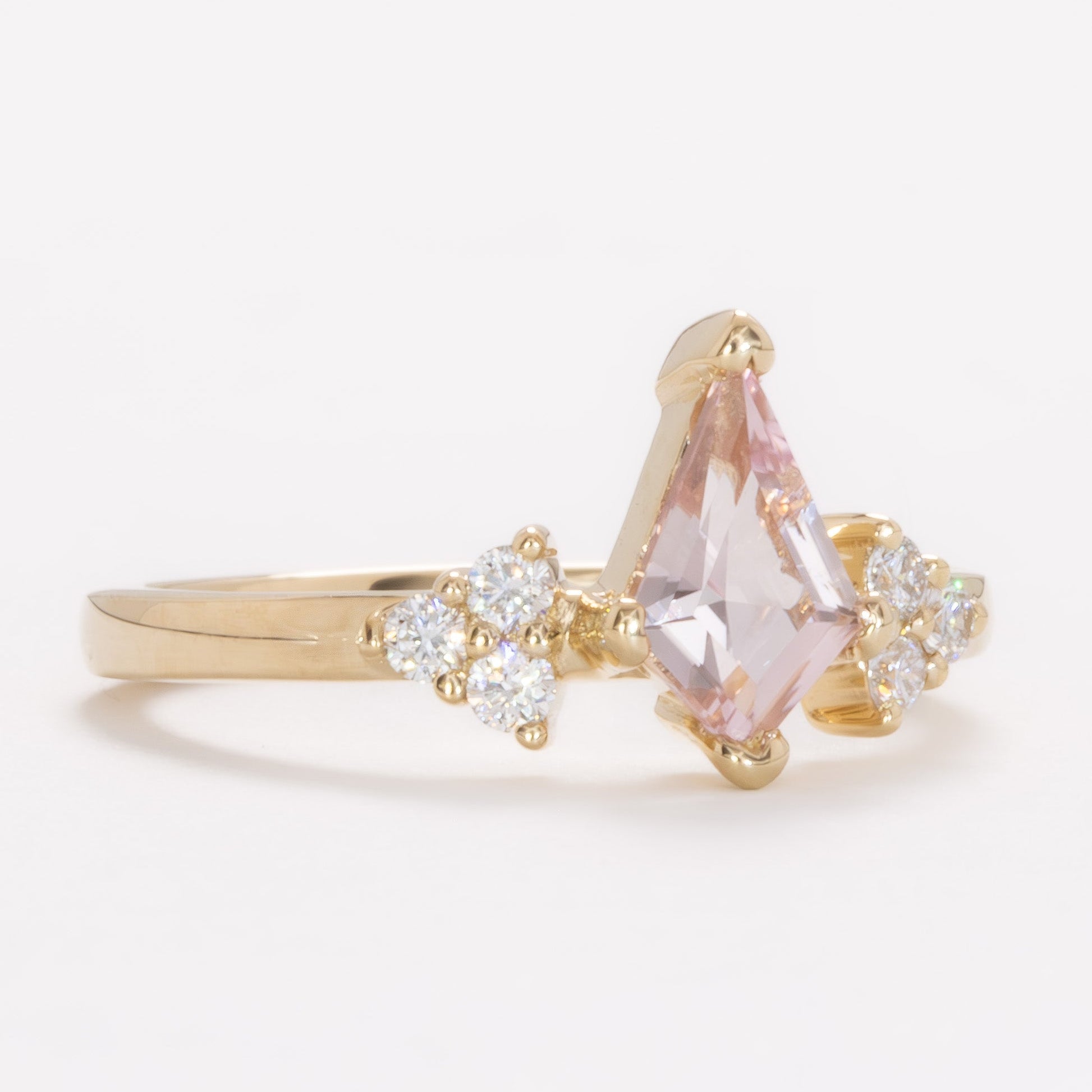 esilda ring with peach lab sapphire kite