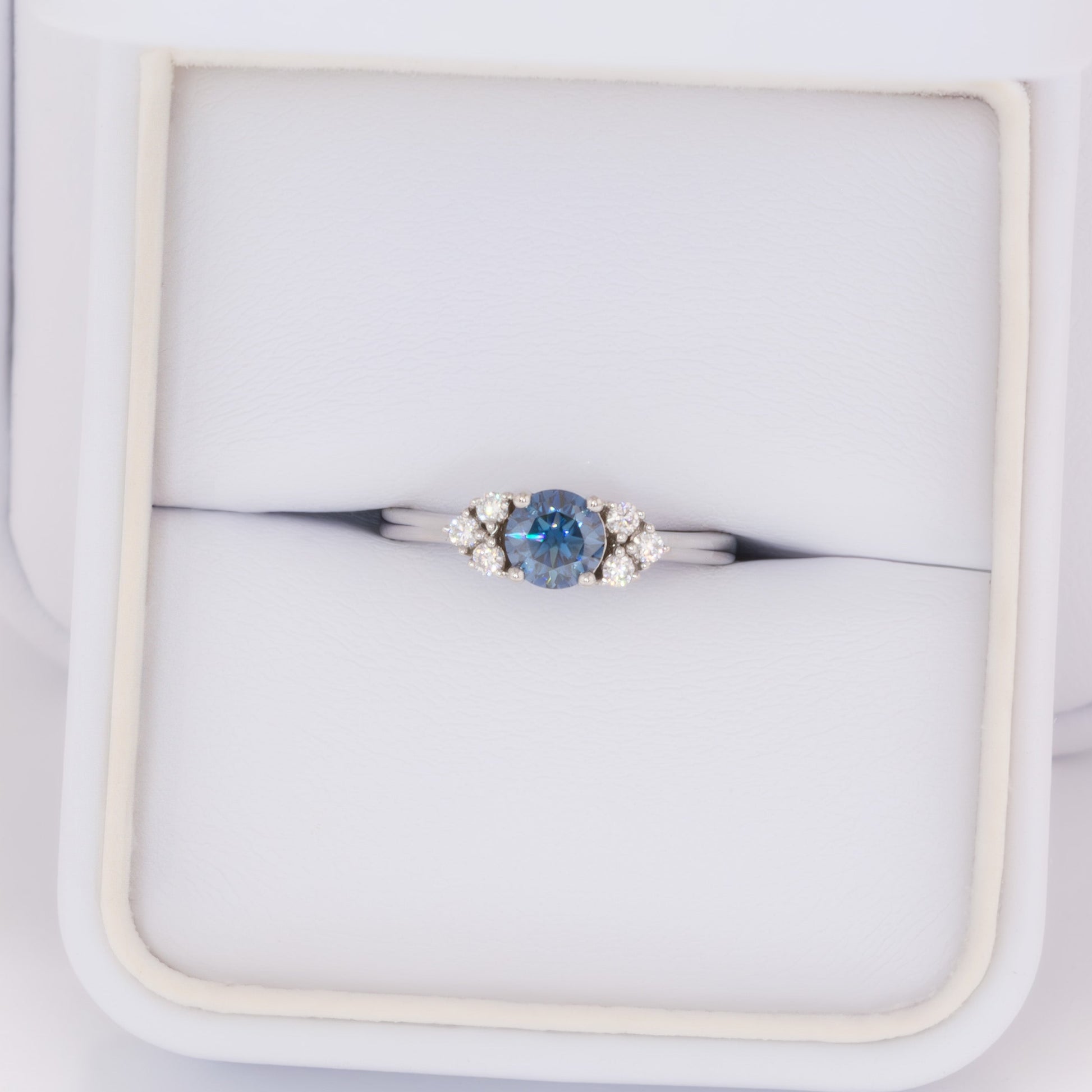 esilda ring with round blue moissanite